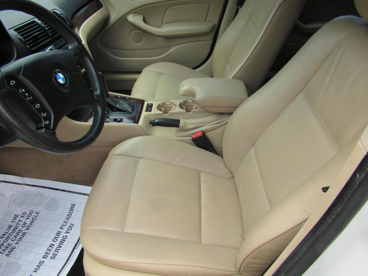 2004 White /Tan BMW 3-Series Sport Wagon 325xi (WBAEP33484P) with an 2.5L L6 DOHC 24V engine, located at 1511 North Shepherd Dr., Houston, TX, 77008, (281) 657-1221, 29.798361, -95.412560 - 2004 BMW 3 Series 325XI 81,305 mi VIN: WBAEP33484PF04486 Vehicle Details Wagon 4 DR 2.5L I6 F DOHC 24V Gasoline All wheel drive - Photo#3