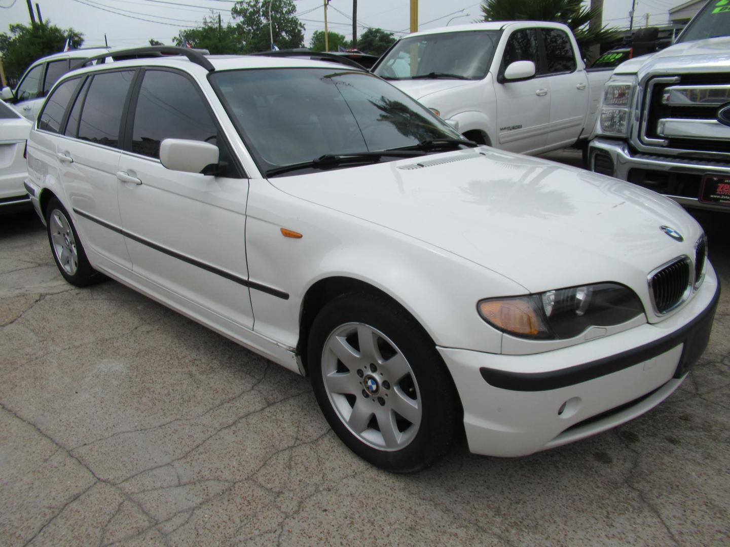 2004 White /Tan BMW 3-Series Sport Wagon 325xi (WBAEP33484P) with an 2.5L L6 DOHC 24V engine, located at 1511 North Shepherd Dr., Houston, TX, 77008, (281) 657-1221, 29.798361, -95.412560 - 2004 BMW 3 Series 325XI 81,305 mi VIN: WBAEP33484PF04486 Vehicle Details Wagon 4 DR 2.5L I6 F DOHC 24V Gasoline All wheel drive - Photo#25
