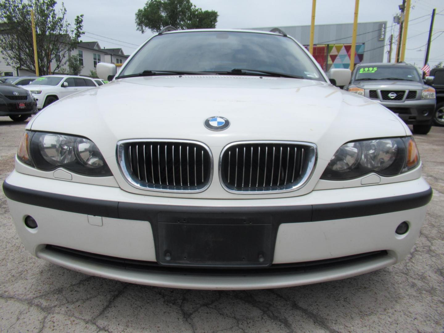 2004 White /Tan BMW 3-Series Sport Wagon 325xi (WBAEP33484P) with an 2.5L L6 DOHC 24V engine, located at 1511 North Shepherd Dr., Houston, TX, 77008, (281) 657-1221, 29.798361, -95.412560 - 2004 BMW 3 Series 325XI 81,305 mi VIN: WBAEP33484PF04486 Vehicle Details Wagon 4 DR 2.5L I6 F DOHC 24V Gasoline All wheel drive - Photo#31