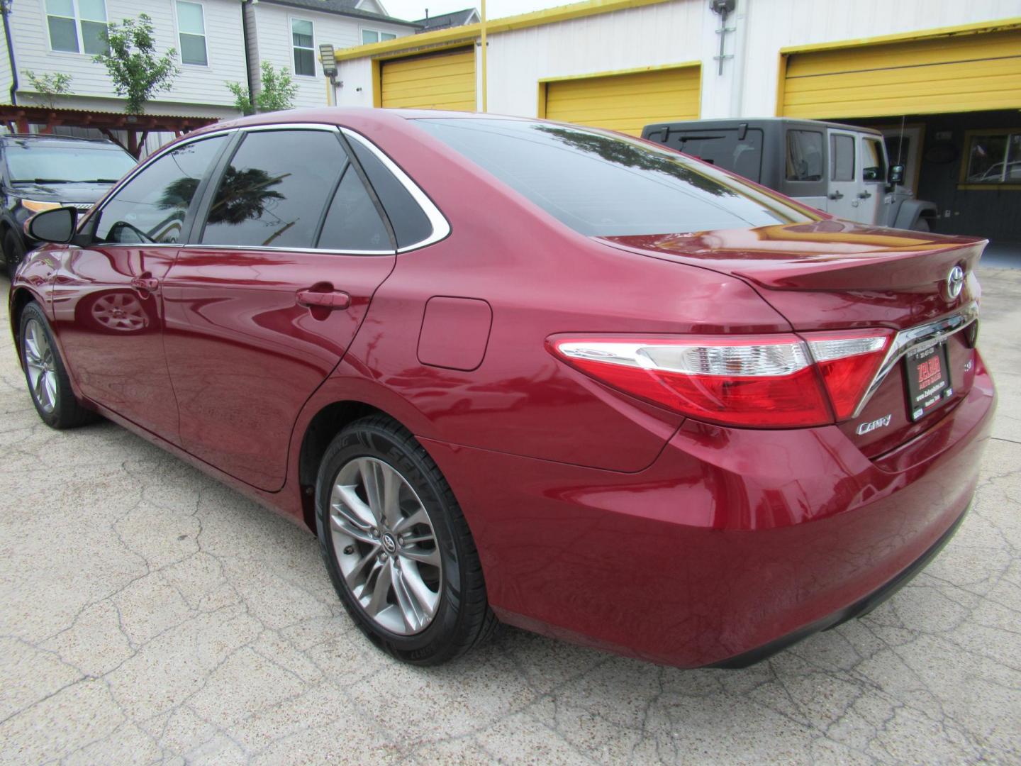 2017 Red /Black Toyota Camry SE (4T1BF1FK1HU) with an 2.5L L4 DOHC 16V engine, 6A transmission, located at 1511 North Shepherd Dr., Houston, TX, 77008, (281) 657-1221, 29.798361, -95.412560 - 2017 Toyota Camry SE 155,815 mi VIN: 4T1BF1FK1HU814132 Vehicle Details Sedan 4 DR 2.5L I4 F DOHC 16V Gasoline Front wheel drive - Photo#15