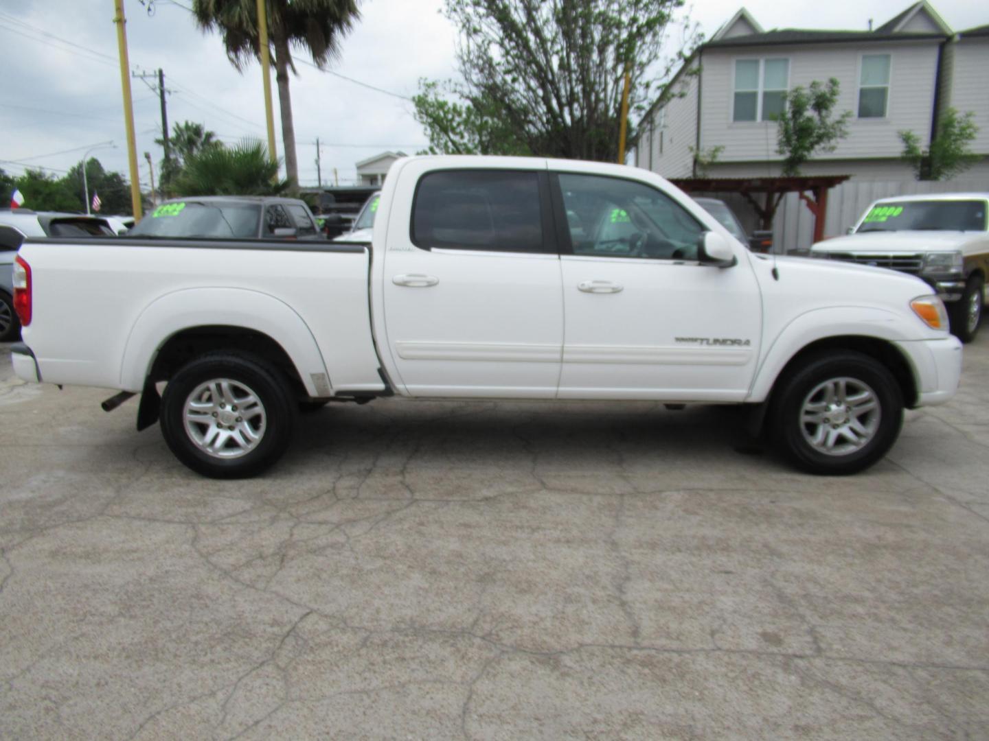 2005 White /Tan Toyota Tundra Limited Double Cab 4WD (5TBDT48125S) with an 4.7L V8 DOHC 32V engine, 5-Speed Automatic Overdrive transmission, located at 1511 North Shepherd Dr., Houston, TX, 77008, (281) 657-1221, 29.798361, -95.412560 - 2005 Toyota Tundra Limited 130,737 mi VIN: 5TBDT48125S483324 Vehicle Details 4 Door Extended Cab Pickup 4.7L V8 F DOHC 32V Gasoline Rear wheel drive w/ 4X4 - Photo#26