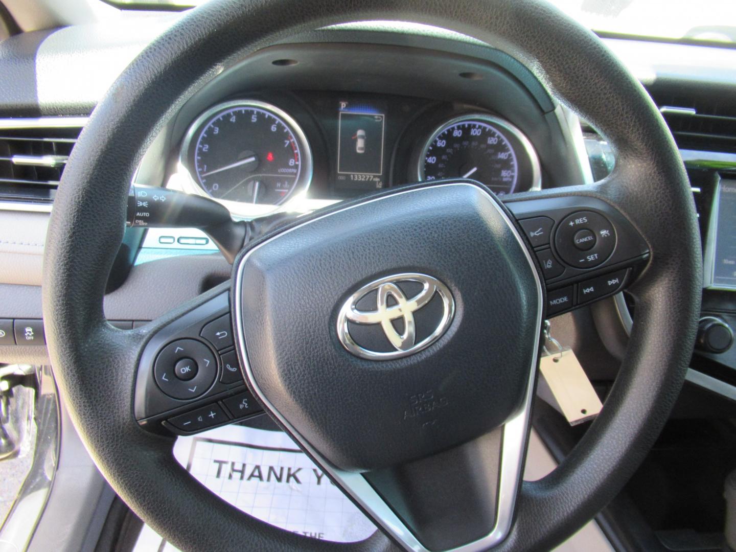 2018 Black /Black Toyota Camry LE (4T1B11HK8JU) with an 2.5L L4 DOHC 16V engine, 8A transmission, located at 1511 North Shepherd Dr., Houston, TX, 77008, (281) 657-1221, 29.798361, -95.412560 - 2018 Toyota Camry L 133,198 mi VIN: 4T1B11HK8JU077397 Vehicle Details Sedan 4 DR 2.5L I4 F DOHC 16V Gasoline Front wheel drive- Photo#3