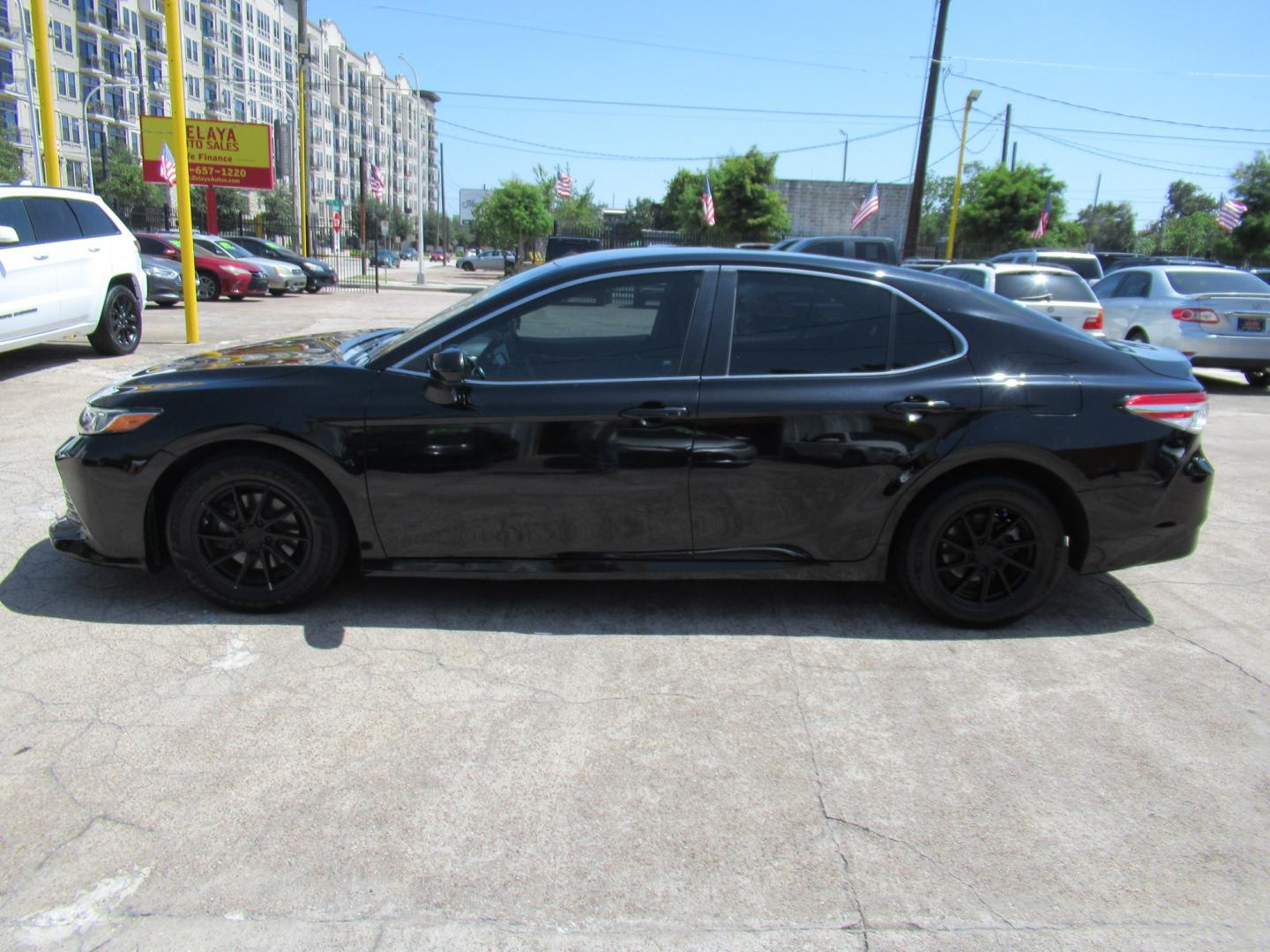 2018 Black /Black Toyota Camry LE (4T1B11HK8JU) with an 2.5L L4 DOHC 16V engine, 8A transmission, located at 1511 North Shepherd Dr., Houston, TX, 77008, (281) 657-1221, 29.798361, -95.412560 - 2018 Toyota Camry L 133,198 mi VIN: 4T1B11HK8JU077397 Vehicle Details Sedan 4 DR 2.5L I4 F DOHC 16V Gasoline Front wheel drive- Photo#18