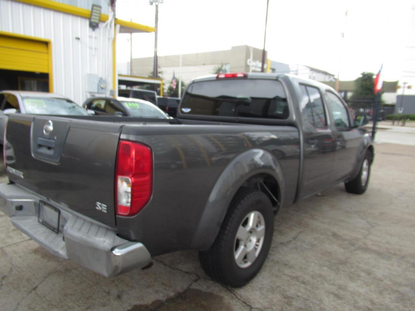 2007 Nissan Frontier LE Crew Cab Long Bed 2WD (1N6AD09U47C) with an 4.0L V6 DOHC 24V engine, 5-Speed Automatic Overdrive transmission, located at 1511 North Shepherd Dr., Houston, TX, 77008, (281) 657-1221, 29.798361, -95.412560 - Photo#13
