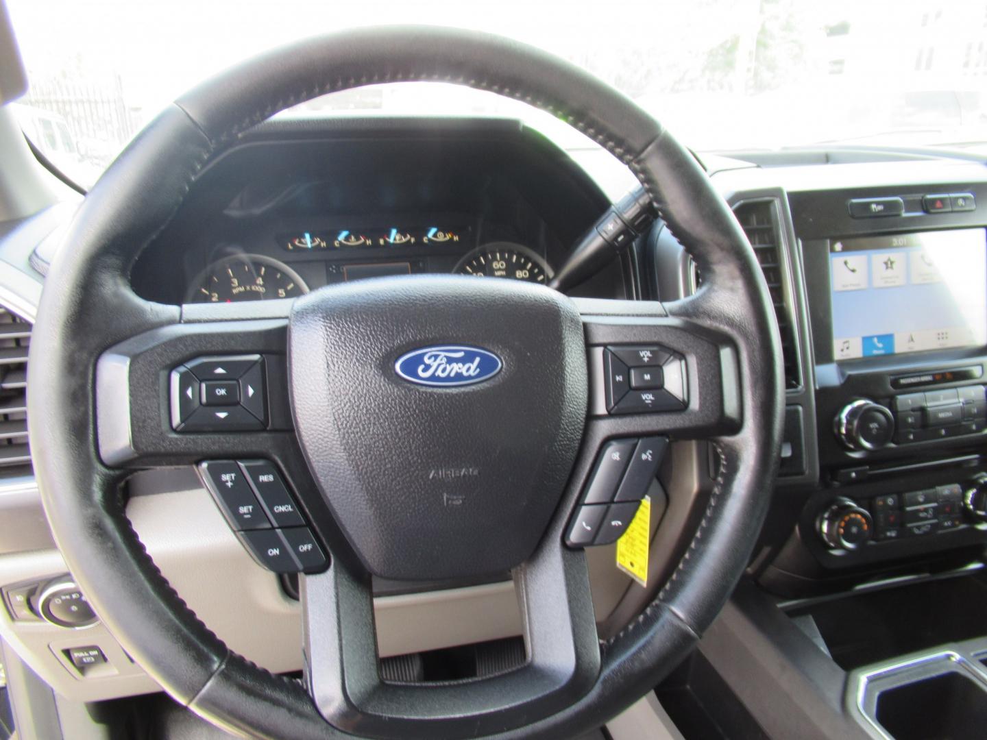 2018 Black /Gray Ford F-150 XLT SuperCrew 5.5-ft. Bed 2WD (1FTEW1CG1JK) with an 3.5L V6 TURBO engine, 6A transmission, located at 1511 North Shepherd Dr., Houston, TX, 77008, (281) 657-1221, 29.798361, -95.412560 - 2018 Ford F-150 XLT 129,418 mi VIN: 1FTEW1CG1JKF55757 Vehicle Details Crew Pickup 3.5L V6 F DOHC 24VGasoline Rear wheel drive- Photo#6