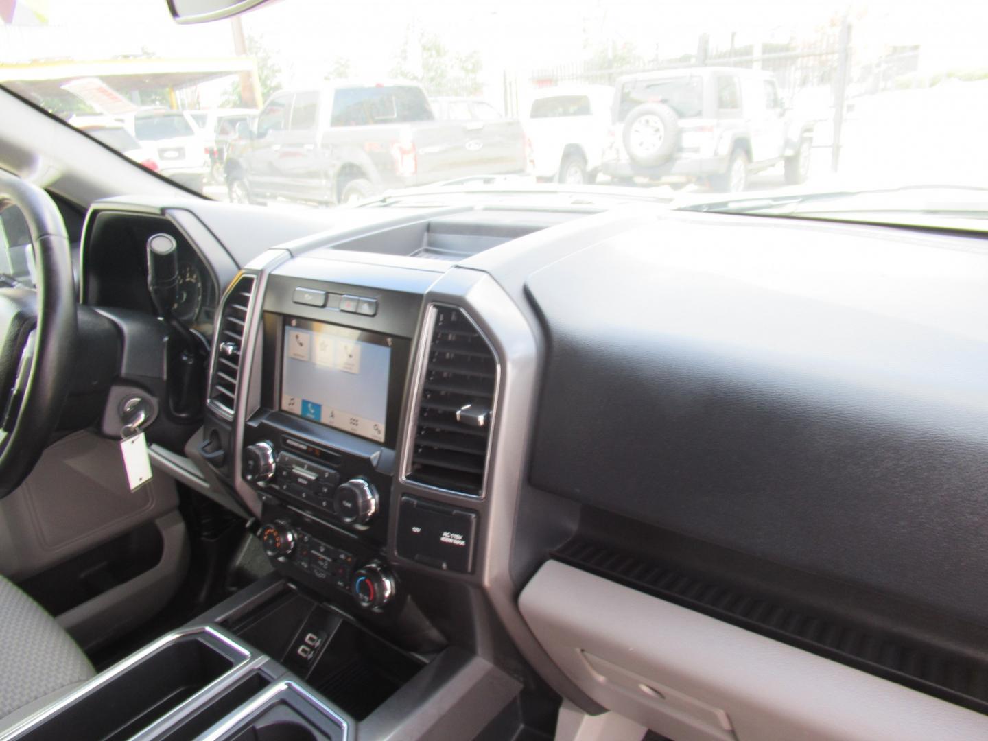 2018 Black /Gray Ford F-150 XLT SuperCrew 5.5-ft. Bed 2WD (1FTEW1CG1JK) with an 3.5L V6 TURBO engine, 6A transmission, located at 1511 North Shepherd Dr., Houston, TX, 77008, (281) 657-1221, 29.798361, -95.412560 - 2018 Ford F-150 XLT 129,418 mi VIN: 1FTEW1CG1JKF55757 Vehicle Details Crew Pickup 3.5L V6 F DOHC 24VGasoline Rear wheel drive- Photo#17