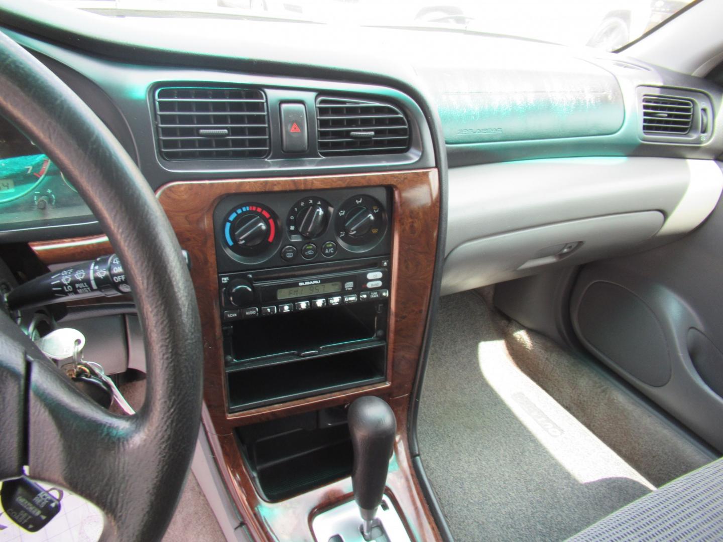 2003 Gold /Gray Subaru Outback Wagon w/ All-weather Package (4S3BH675537) with an 2.5L H4 SOHC 16V engine, 4A OD transmission, located at 1511 North Shepherd Dr., Houston, TX, 77008, (281) 657-1221, 29.798361, -95.412560 - 2003 Subaru Outback VIN: 4S3BH675537617296 Vehicle Details Wagon 4 DR 2.5L H4 F SOHC 16VGasoline All wheel drive- Photo#3
