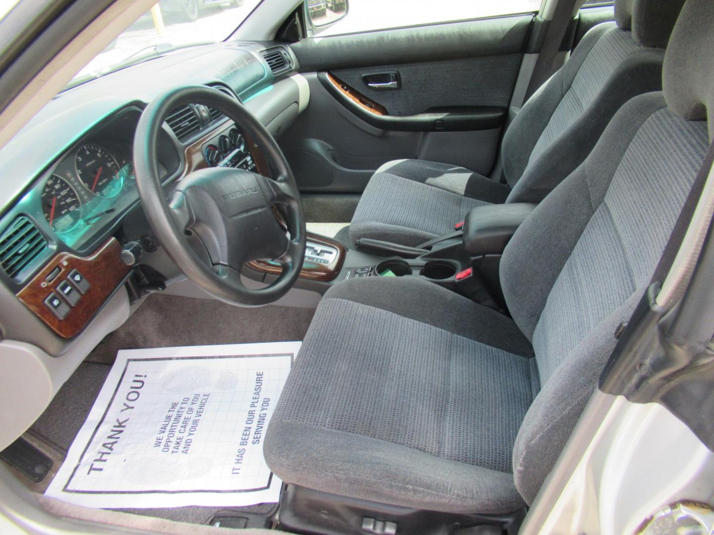 2003 Gold /Gray Subaru Outback Wagon w/ All-weather Package (4S3BH675537) with an 2.5L H4 SOHC 16V engine, 4A OD transmission, located at 1511 North Shepherd Dr., Houston, TX, 77008, (281) 657-1221, 29.798361, -95.412560 - 2003 Subaru Outback VIN: 4S3BH675537617296 Vehicle Details Wagon 4 DR 2.5L H4 F SOHC 16VGasoline All wheel drive- Photo#1