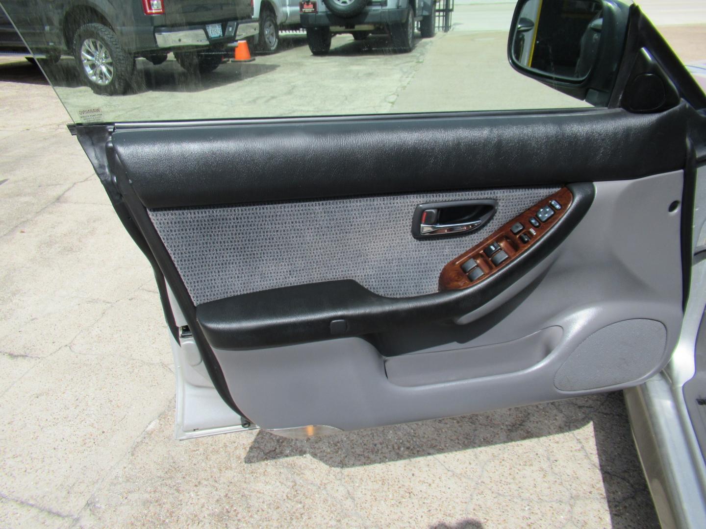 2003 Gold /Gray Subaru Outback Wagon w/ All-weather Package (4S3BH675537) with an 2.5L H4 SOHC 16V engine, 4A OD transmission, located at 1511 North Shepherd Dr., Houston, TX, 77008, (281) 657-1221, 29.798361, -95.412560 - 2003 Subaru Outback VIN: 4S3BH675537617296 Vehicle Details Wagon 4 DR 2.5L H4 F SOHC 16VGasoline All wheel drive- Photo#5