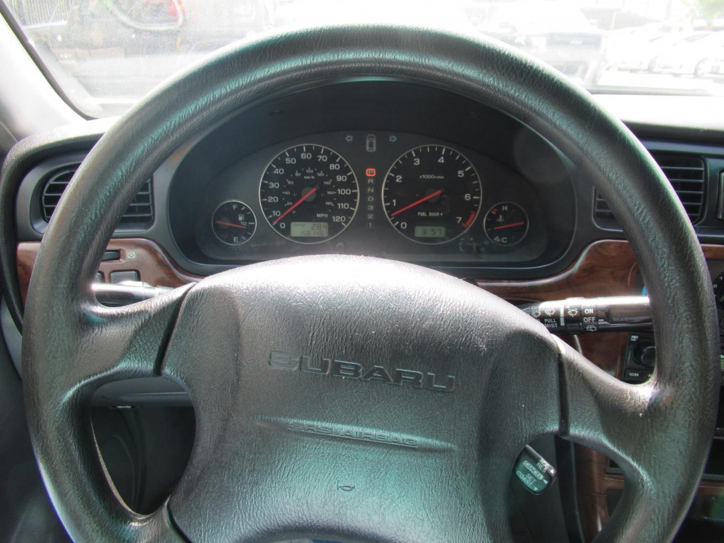2003 Gold /Gray Subaru Outback Wagon w/ All-weather Package (4S3BH675537) with an 2.5L H4 SOHC 16V engine, 4A OD transmission, located at 1511 North Shepherd Dr., Houston, TX, 77008, (281) 657-1221, 29.798361, -95.412560 - 2003 Subaru Outback VIN: 4S3BH675537617296 Vehicle Details Wagon 4 DR 2.5L H4 F SOHC 16VGasoline All wheel drive- Photo#14