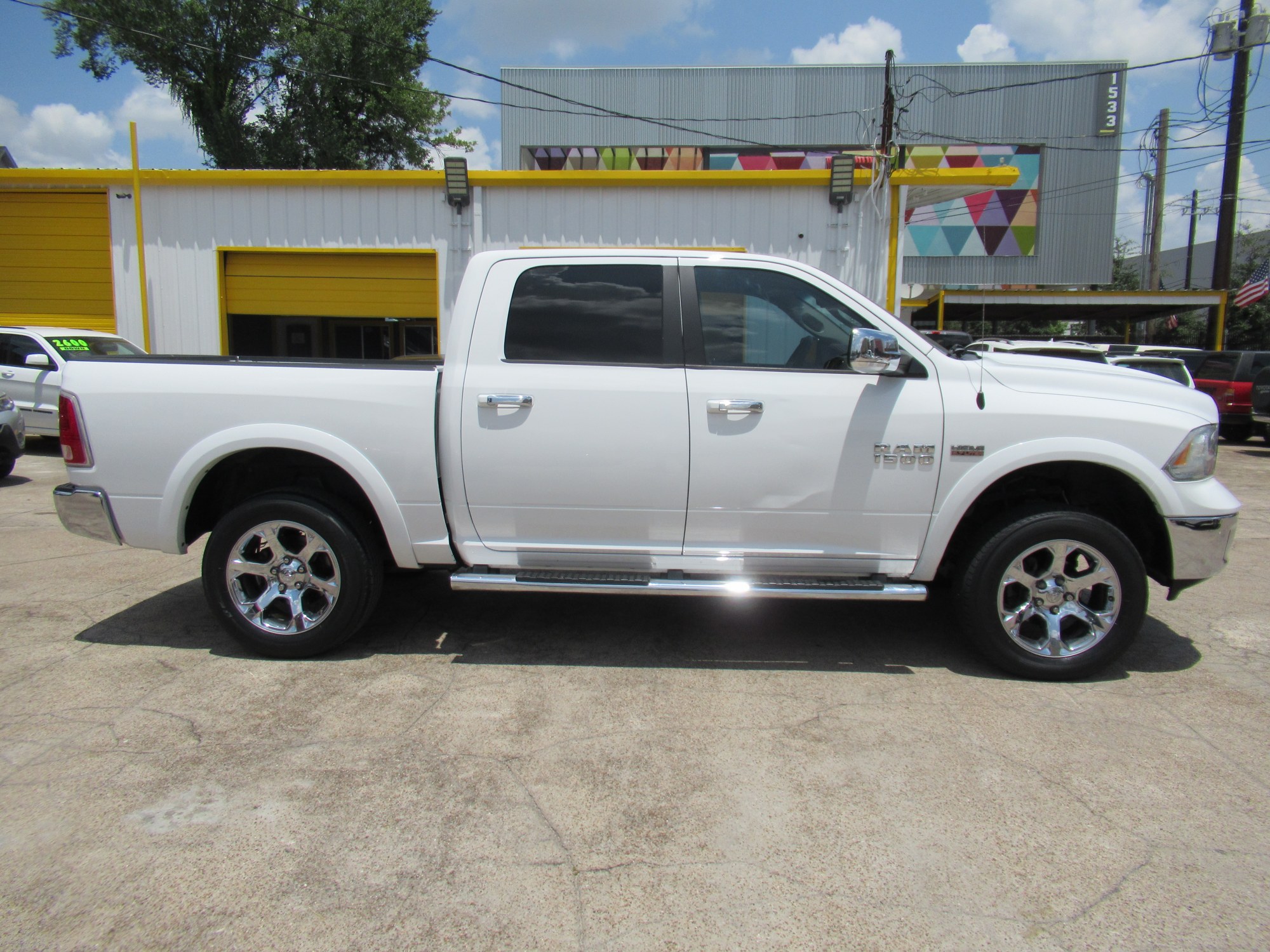 photo of 2015 RAM 1500 Laramie Crew Cab SWB 4WD