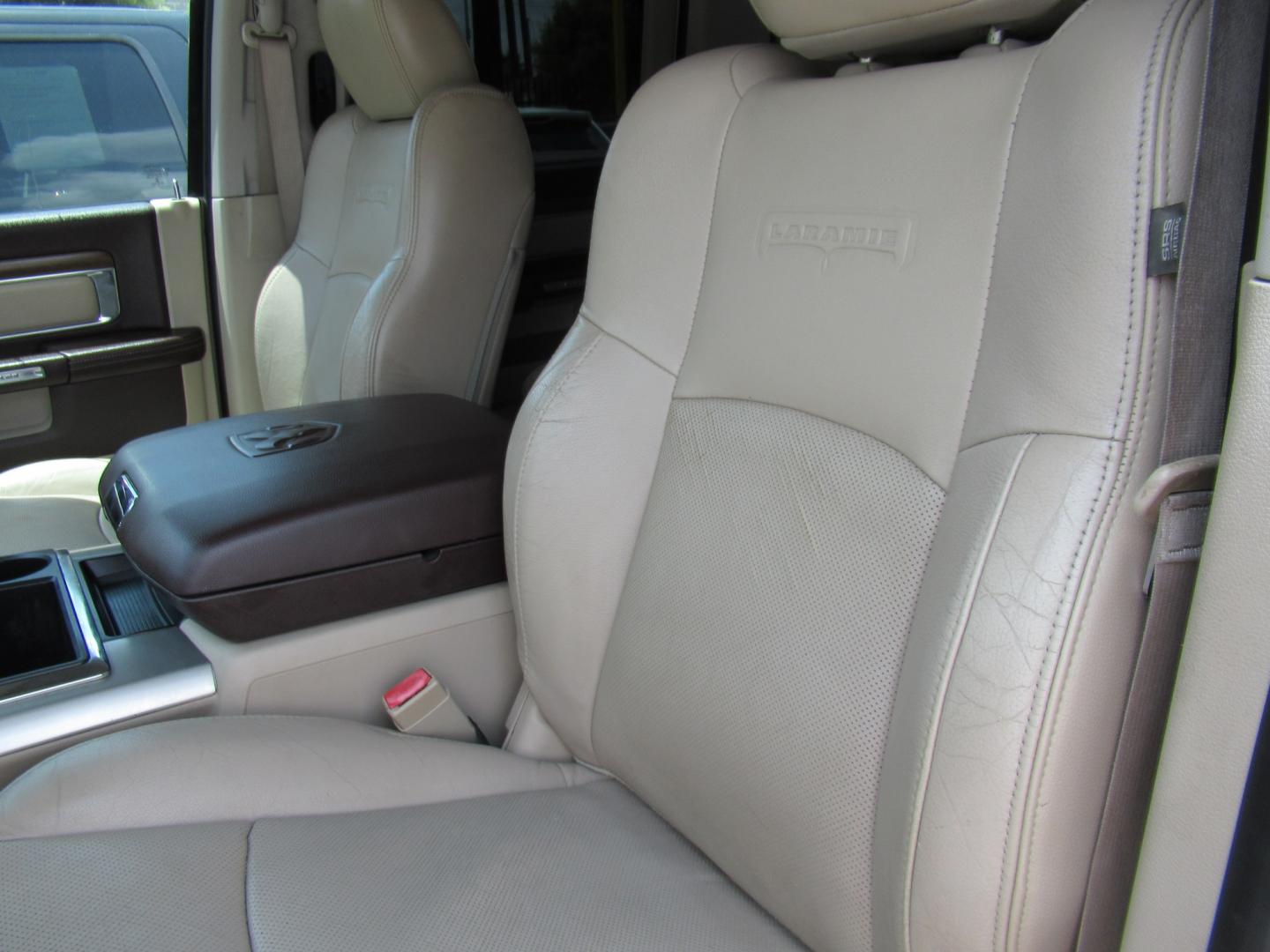 2015 White /Brown RAM 1500 Laramie Crew Cab SWB 4WD (1C6RR7NT9FS) with an 5.7L V8 OHV 16V engine, 6-Speed Automatic transmission, located at 1511 North Shepherd Dr., Houston, TX, 77008, (281) 657-1221, 29.798361, -95.412560 - 2015 Ram 1500 Laramie 145,729 miles VIN: 1C6RR7NT9FS513258 Vehicle Details Crew Pickup 5.7L V8 F OHV 16V Gasoline Rear wheel drive w/ 4X4- Photo#2