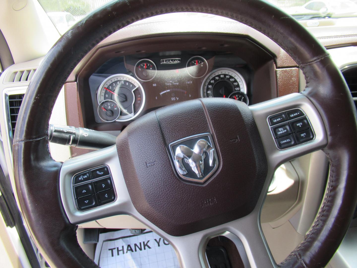 2015 White /Brown RAM 1500 Laramie Crew Cab SWB 4WD (1C6RR7NT9FS) with an 5.7L V8 OHV 16V engine, 6-Speed Automatic transmission, located at 1511 North Shepherd Dr., Houston, TX, 77008, (281) 657-1221, 29.798361, -95.412560 - 2015 Ram 1500 Laramie 145,729 miles VIN: 1C6RR7NT9FS513258 Vehicle Details Crew Pickup 5.7L V8 F OHV 16V Gasoline Rear wheel drive w/ 4X4- Photo#3