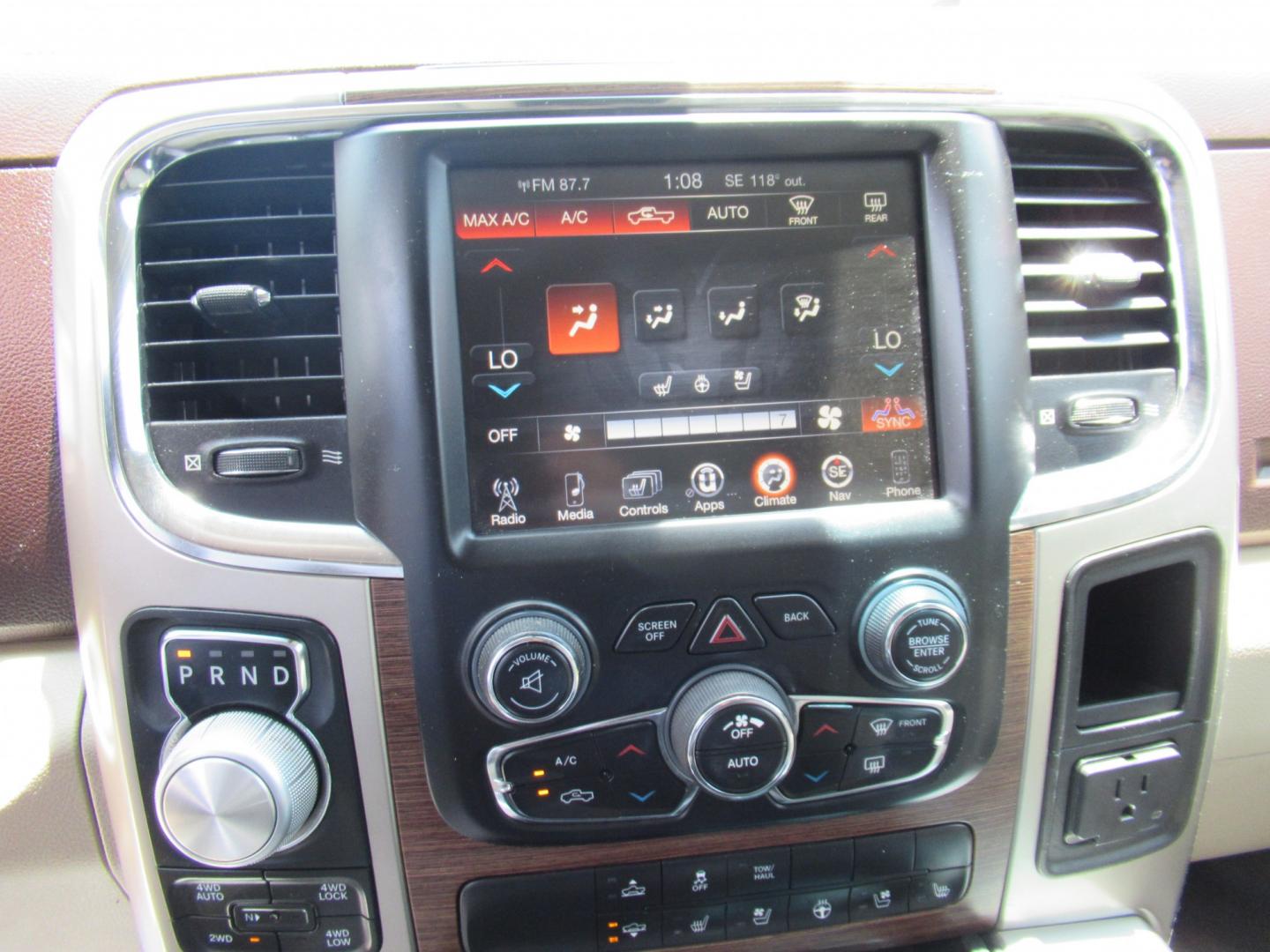 2015 White /Brown RAM 1500 Laramie Crew Cab SWB 4WD (1C6RR7NT9FS) with an 5.7L V8 OHV 16V engine, 6-Speed Automatic transmission, located at 1511 North Shepherd Dr., Houston, TX, 77008, (281) 657-1221, 29.798361, -95.412560 - 2015 Ram 1500 Laramie 145,729 miles VIN: 1C6RR7NT9FS513258 Vehicle Details Crew Pickup 5.7L V8 F OHV 16V Gasoline Rear wheel drive w/ 4X4- Photo#4