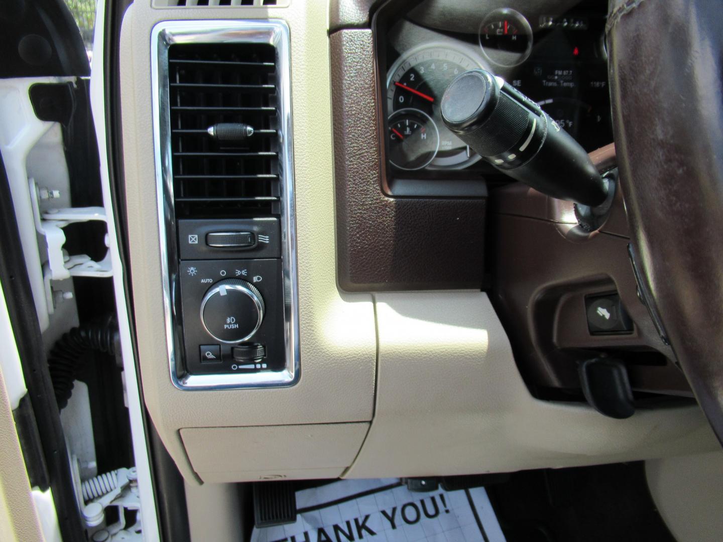 2015 White /Brown RAM 1500 Laramie Crew Cab SWB 4WD (1C6RR7NT9FS) with an 5.7L V8 OHV 16V engine, 6-Speed Automatic transmission, located at 1511 North Shepherd Dr., Houston, TX, 77008, (281) 657-1221, 29.798361, -95.412560 - 2015 Ram 1500 Laramie 145,729 miles VIN: 1C6RR7NT9FS513258 Vehicle Details Crew Pickup 5.7L V8 F OHV 16V Gasoline Rear wheel drive w/ 4X4- Photo#8