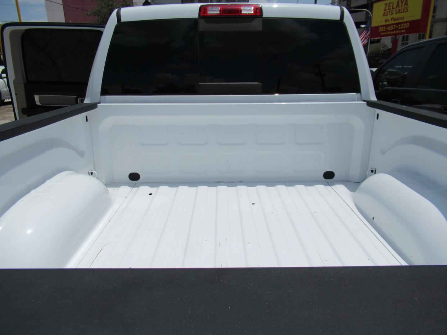 2015 White /Brown RAM 1500 Laramie Crew Cab SWB 4WD (1C6RR7NT9FS) with an 5.7L V8 OHV 16V engine, 6-Speed Automatic transmission, located at 1511 North Shepherd Dr., Houston, TX, 77008, (281) 657-1221, 29.798361, -95.412560 - 2015 Ram 1500 Laramie 145,729 miles VIN: 1C6RR7NT9FS513258 Vehicle Details Crew Pickup 5.7L V8 F OHV 16V Gasoline Rear wheel drive w/ 4X4- Photo#15
