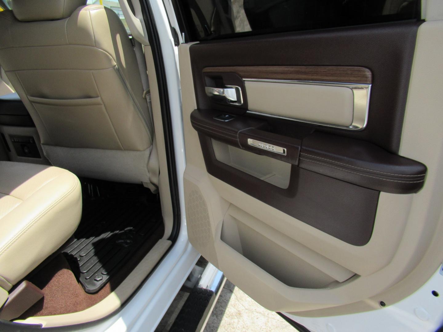 2015 White /Brown RAM 1500 Laramie Crew Cab SWB 4WD (1C6RR7NT9FS) with an 5.7L V8 OHV 16V engine, 6-Speed Automatic transmission, located at 1511 North Shepherd Dr., Houston, TX, 77008, (281) 657-1221, 29.798361, -95.412560 - 2015 Ram 1500 Laramie 145,729 miles VIN: 1C6RR7NT9FS513258 Vehicle Details Crew Pickup 5.7L V8 F OHV 16V Gasoline Rear wheel drive w/ 4X4- Photo#16
