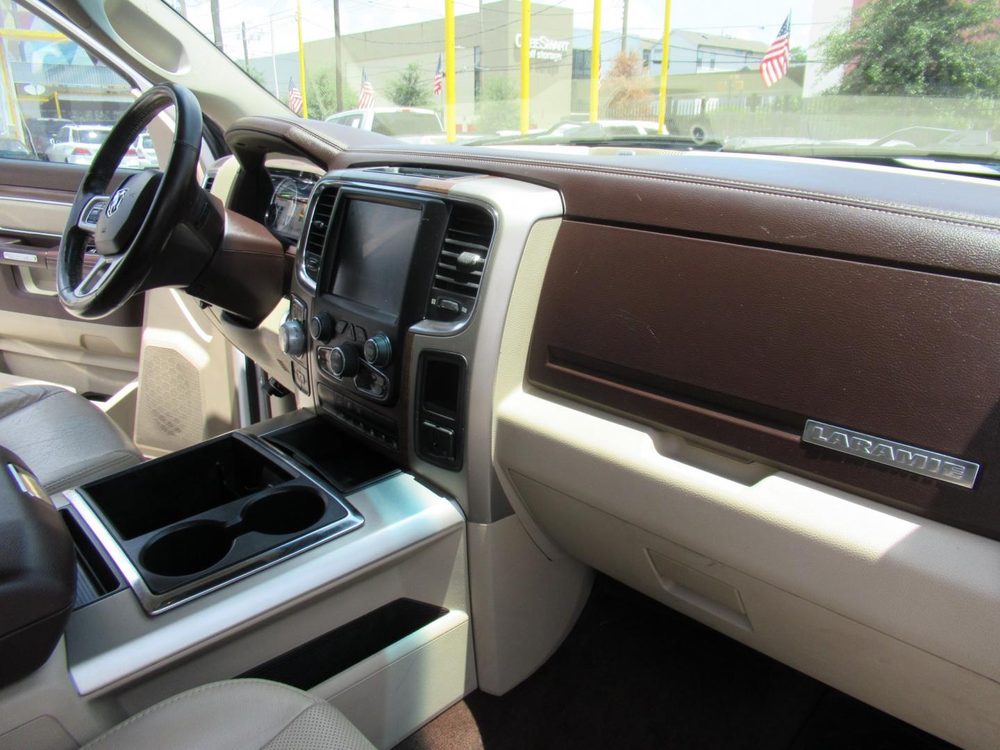 2015 White /Brown RAM 1500 Laramie Crew Cab SWB 4WD (1C6RR7NT9FS) with an 5.7L V8 OHV 16V engine, 6-Speed Automatic transmission, located at 1511 North Shepherd Dr., Houston, TX, 77008, (281) 657-1221, 29.798361, -95.412560 - 2015 Ram 1500 Laramie 145,729 miles VIN: 1C6RR7NT9FS513258 Vehicle Details Crew Pickup 5.7L V8 F OHV 16V Gasoline Rear wheel drive w/ 4X4- Photo#20