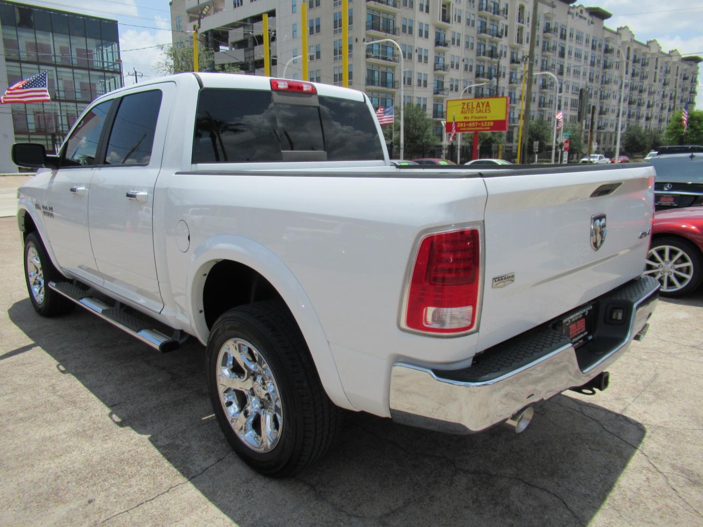2015 White /Brown RAM 1500 Laramie Crew Cab SWB 4WD (1C6RR7NT9FS) with an 5.7L V8 OHV 16V engine, 6-Speed Automatic transmission, located at 1511 North Shepherd Dr., Houston, TX, 77008, (281) 657-1221, 29.798361, -95.412560 - 2015 Ram 1500 Laramie 145,729 miles VIN: 1C6RR7NT9FS513258 Vehicle Details Crew Pickup 5.7L V8 F OHV 16V Gasoline Rear wheel drive w/ 4X4- Photo#23