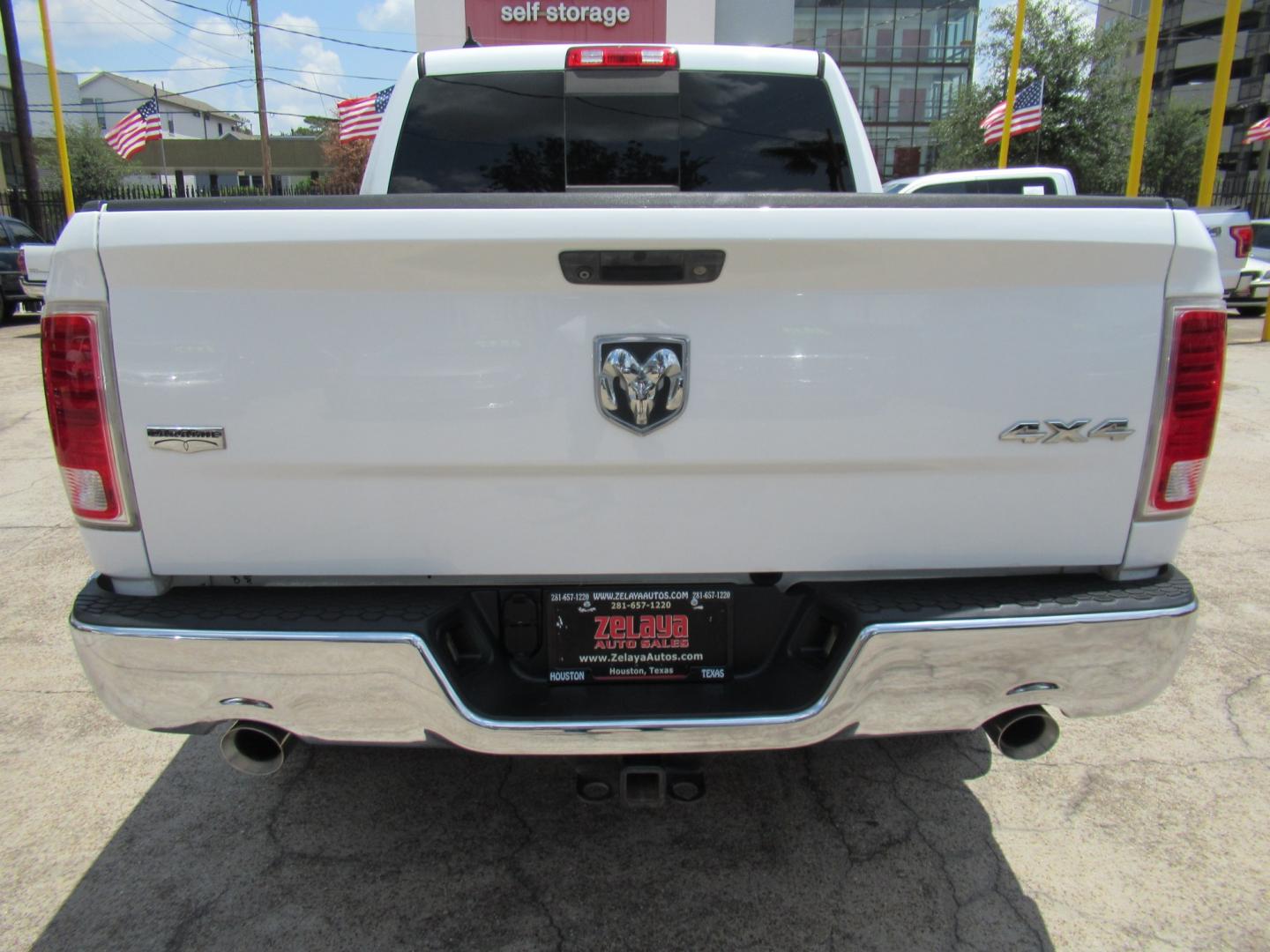 2015 White /Brown RAM 1500 Laramie Crew Cab SWB 4WD (1C6RR7NT9FS) with an 5.7L V8 OHV 16V engine, 6-Speed Automatic transmission, located at 1511 North Shepherd Dr., Houston, TX, 77008, (281) 657-1221, 29.798361, -95.412560 - 2015 Ram 1500 Laramie 145,729 miles VIN: 1C6RR7NT9FS513258 Vehicle Details Crew Pickup 5.7L V8 F OHV 16V Gasoline Rear wheel drive w/ 4X4- Photo#24