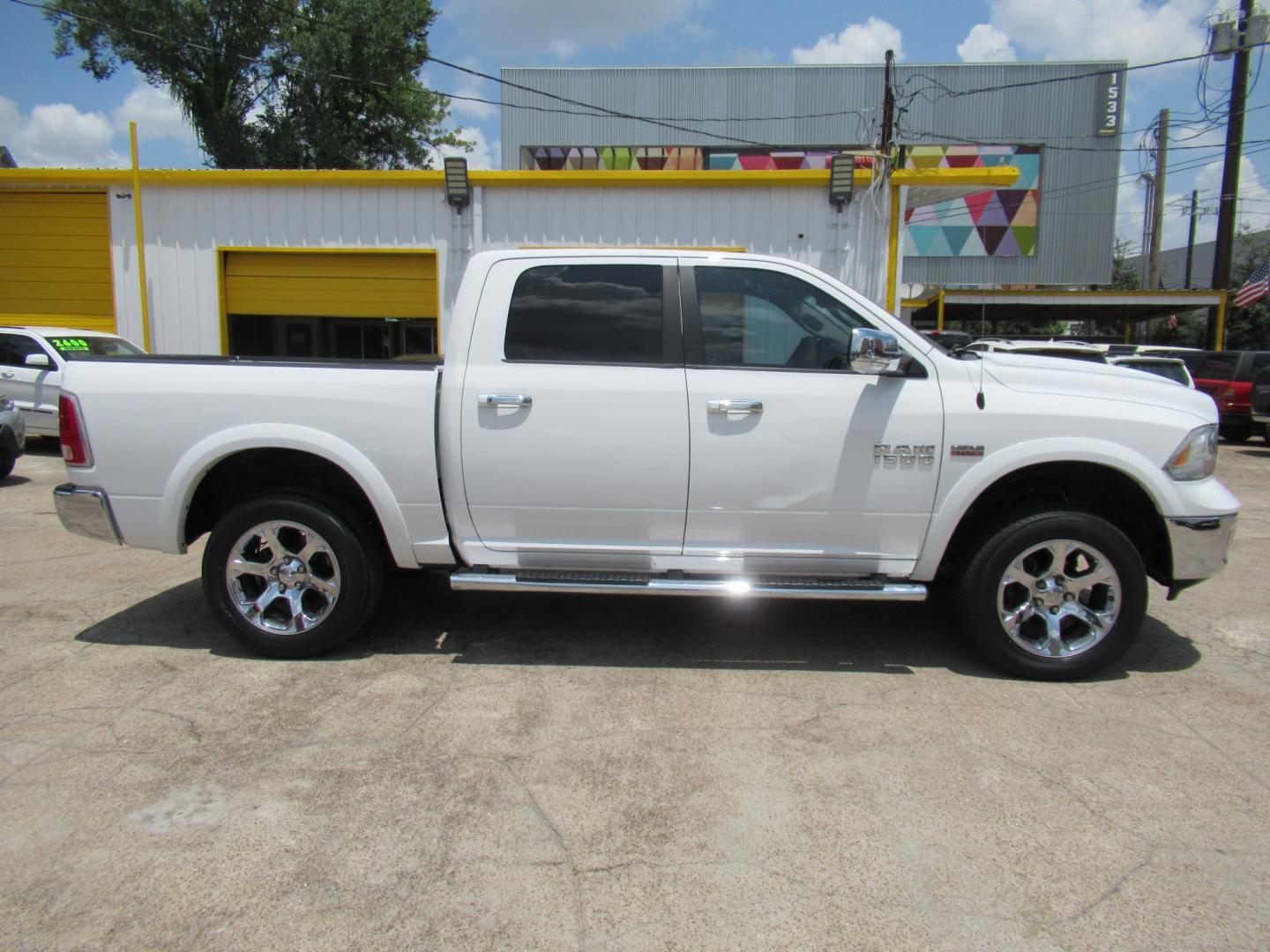 2015 White /Brown RAM 1500 Laramie Crew Cab SWB 4WD (1C6RR7NT9FS) with an 5.7L V8 OHV 16V engine, 6-Speed Automatic transmission, located at 1511 North Shepherd Dr., Houston, TX, 77008, (281) 657-1221, 29.798361, -95.412560 - 2015 Ram 1500 Laramie 145,729 miles VIN: 1C6RR7NT9FS513258 Vehicle Details Crew Pickup 5.7L V8 F OHV 16V Gasoline Rear wheel drive w/ 4X4- Photo#26