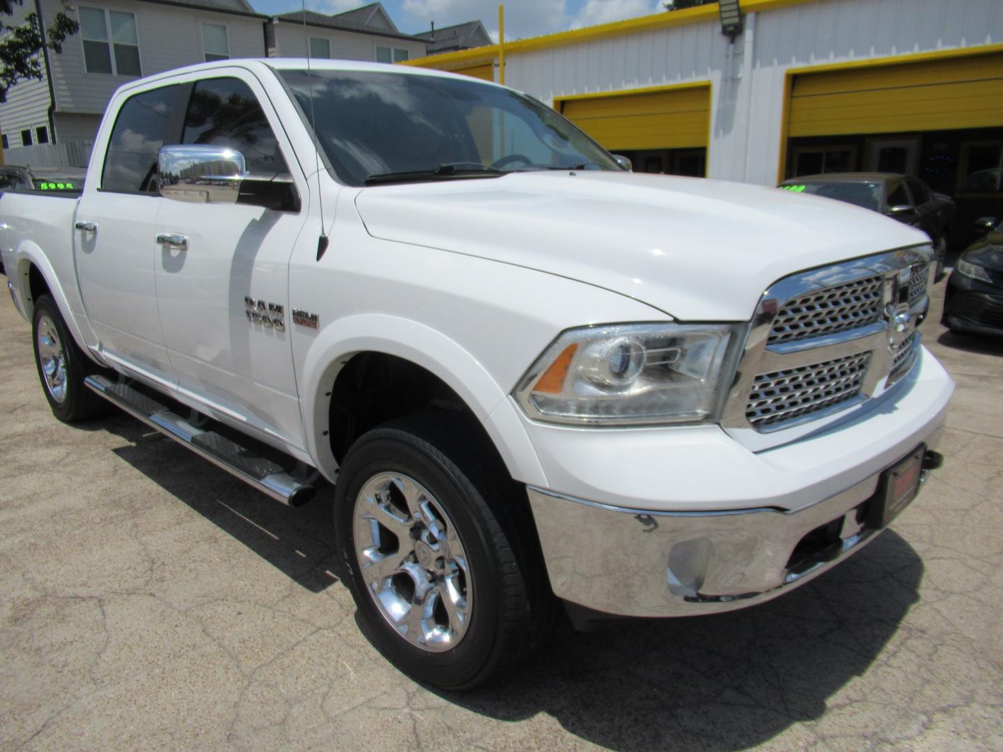 2015 White /Brown RAM 1500 Laramie Crew Cab SWB 4WD (1C6RR7NT9FS) with an 5.7L V8 OHV 16V engine, 6-Speed Automatic transmission, located at 1511 North Shepherd Dr., Houston, TX, 77008, (281) 657-1221, 29.798361, -95.412560 - 2015 Ram 1500 Laramie 145,729 miles VIN: 1C6RR7NT9FS513258 Vehicle Details Crew Pickup 5.7L V8 F OHV 16V Gasoline Rear wheel drive w/ 4X4- Photo#27