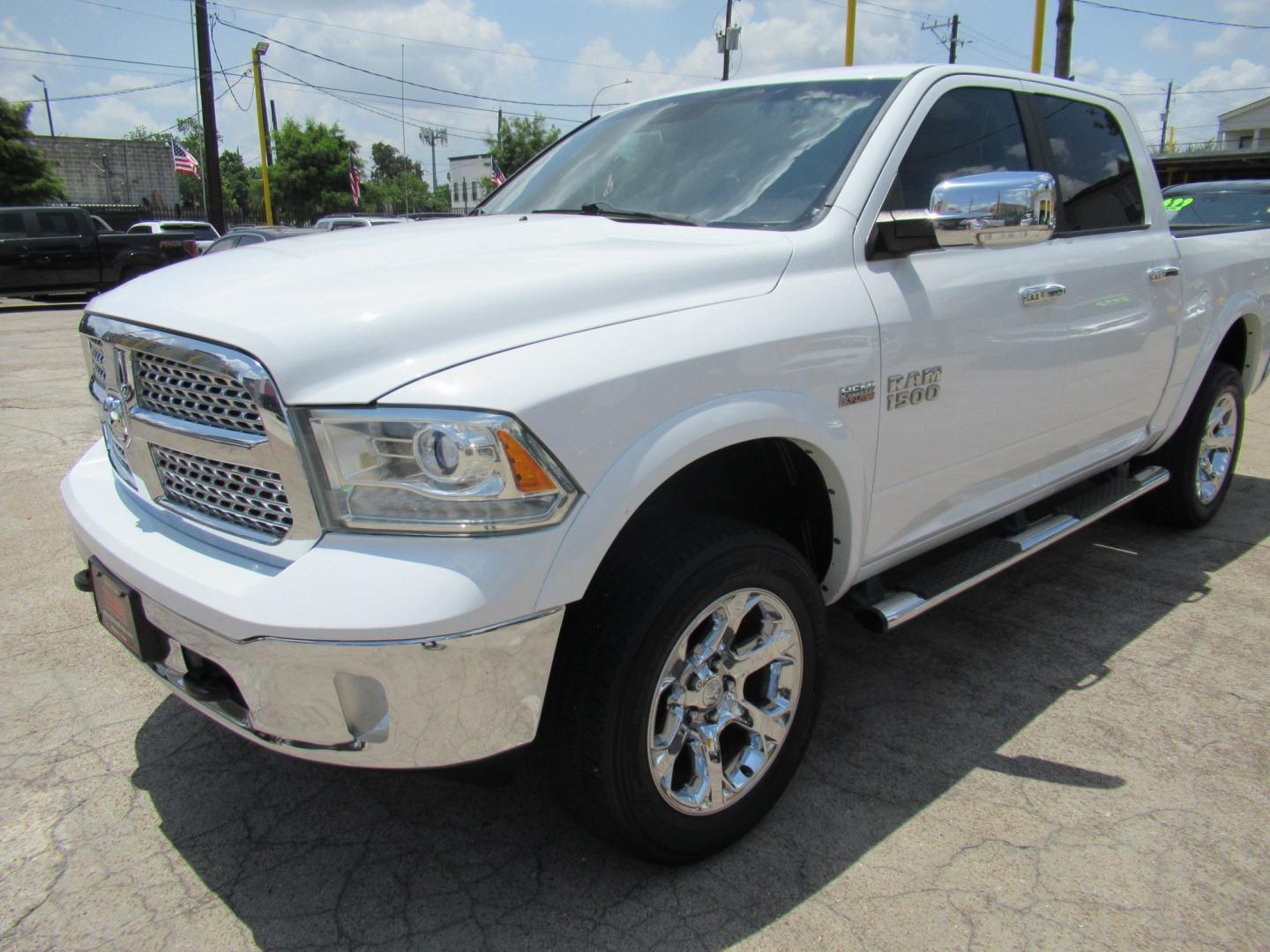 2015 White /Brown RAM 1500 Laramie Crew Cab SWB 4WD (1C6RR7NT9FS) with an 5.7L V8 OHV 16V engine, 6-Speed Automatic transmission, located at 1511 North Shepherd Dr., Houston, TX, 77008, (281) 657-1221, 29.798361, -95.412560 - 2015 Ram 1500 Laramie 145,729 miles VIN: 1C6RR7NT9FS513258 Vehicle Details Crew Pickup 5.7L V8 F OHV 16V Gasoline Rear wheel drive w/ 4X4- Photo#30