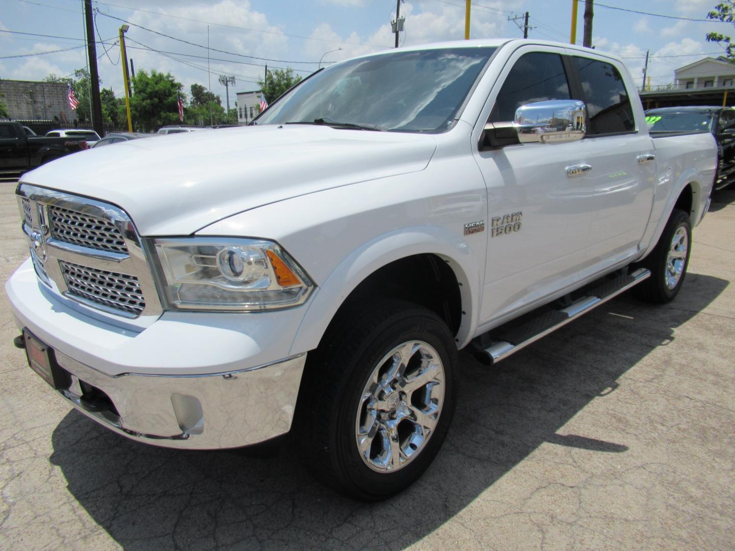 2015 White /Brown RAM 1500 Laramie Crew Cab SWB 4WD (1C6RR7NT9FS) with an 5.7L V8 OHV 16V engine, 6-Speed Automatic transmission, located at 1511 North Shepherd Dr., Houston, TX, 77008, (281) 657-1221, 29.798361, -95.412560 - 2015 Ram 1500 Laramie 145,729 miles VIN: 1C6RR7NT9FS513258 Vehicle Details Crew Pickup 5.7L V8 F OHV 16V Gasoline Rear wheel drive w/ 4X4- Photo#31