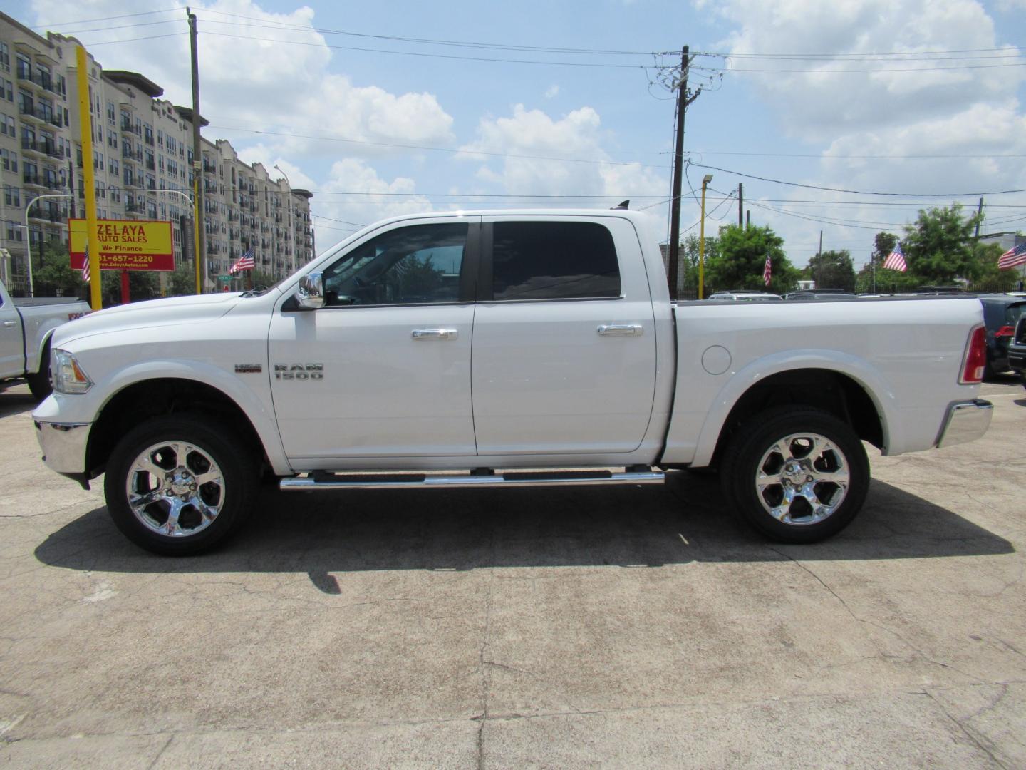 2015 White /Brown RAM 1500 Laramie Crew Cab SWB 4WD (1C6RR7NT9FS) with an 5.7L V8 OHV 16V engine, 6-Speed Automatic transmission, located at 1511 North Shepherd Dr., Houston, TX, 77008, (281) 657-1221, 29.798361, -95.412560 - 2015 Ram 1500 Laramie 145,729 miles VIN: 1C6RR7NT9FS513258 Vehicle Details Crew Pickup 5.7L V8 F OHV 16V Gasoline Rear wheel drive w/ 4X4- Photo#32