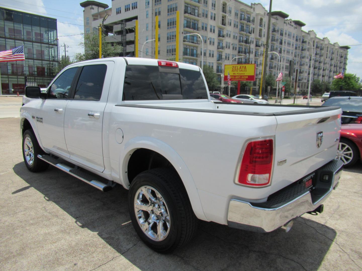 2015 White /Brown RAM 1500 Laramie Crew Cab SWB 4WD (1C6RR7NT9FS) with an 5.7L V8 OHV 16V engine, 6-Speed Automatic transmission, located at 1511 North Shepherd Dr., Houston, TX, 77008, (281) 657-1221, 29.798361, -95.412560 - 2015 Ram 1500 Laramie 145,729 miles VIN: 1C6RR7NT9FS513258 Vehicle Details Crew Pickup 5.7L V8 F OHV 16V Gasoline Rear wheel drive w/ 4X4- Photo#33