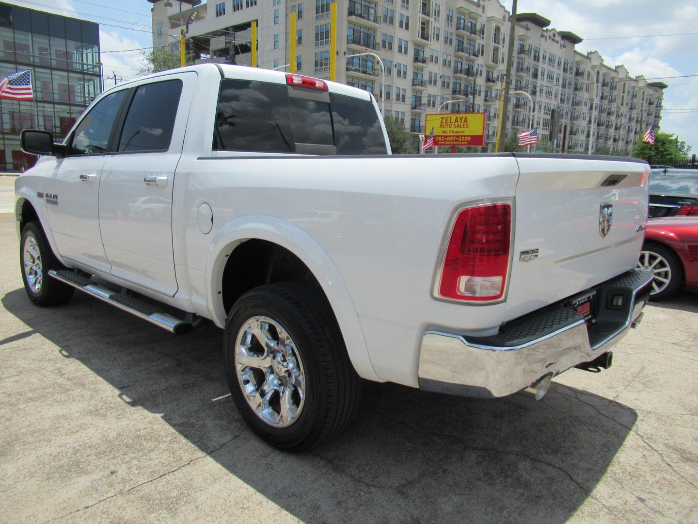 2015 White /Brown RAM 1500 Laramie Crew Cab SWB 4WD (1C6RR7NT9FS) with an 5.7L V8 OHV 16V engine, 6-Speed Automatic transmission, located at 1511 North Shepherd Dr., Houston, TX, 77008, (281) 657-1221, 29.798361, -95.412560 - 2015 Ram 1500 Laramie 145,729 miles VIN: 1C6RR7NT9FS513258 Vehicle Details Crew Pickup 5.7L V8 F OHV 16V Gasoline Rear wheel drive w/ 4X4- Photo#34