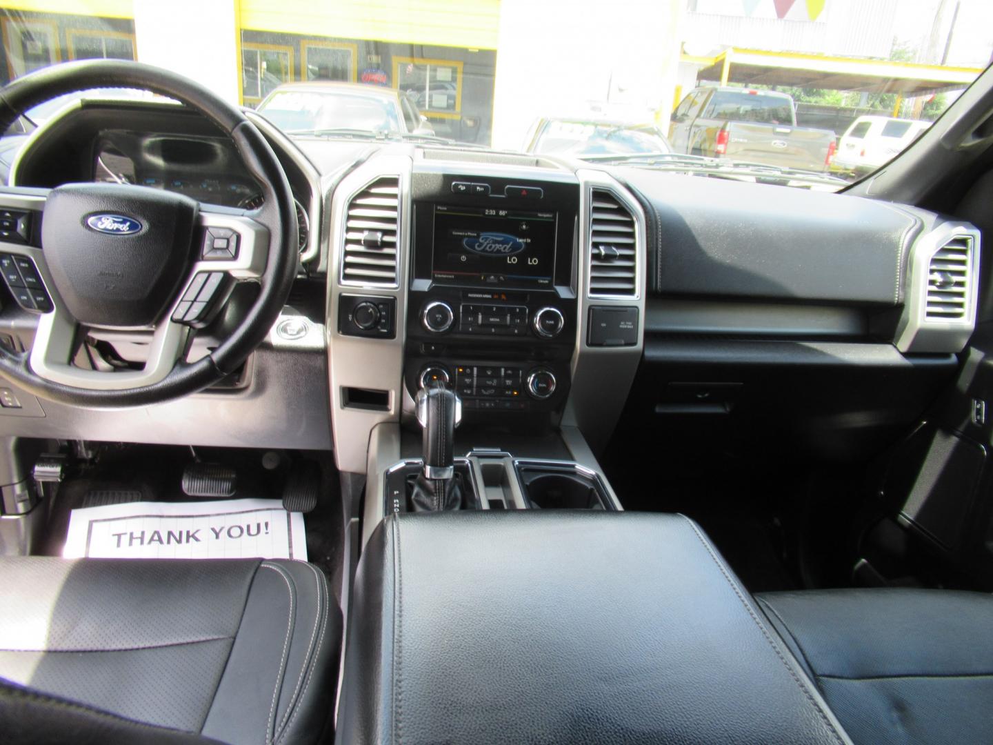 2015 Silver /Black Ford F-150 XLT SuperCrew 6.5-ft. Bed 4WD (1FTEW1EF0FF) with an 5.0L V8 engine, 6-Speed Automatic transmission, located at 1511 North Shepherd Dr., Houston, TX, 77008, (281) 657-1221, 29.798361, -95.412560 - 2015 Ford F-150 Lariat 130,833 miles VIN: 1FTEW1EF0FFA96810 Vehicle Details Crew Pickup 5.0L V8 F DOHC 32V Gasoline Rear wheel drive w/ 4X4- Photo#13