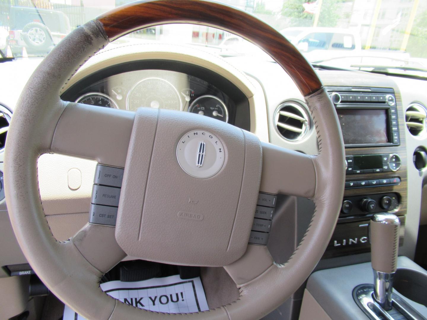2008 White /Tan Lincoln Mark LT 2WD (5LTPW16518F) with an 5.4L V8 SOHC 24V engine, 4A transmission, located at 1511 North Shepherd Dr., Houston, TX, 77008, (281) 657-1221, 29.798361, -95.412560 - 2008 Lincoln Mark LT 219,705 miles VIN: 5LTPW16518FJ04007 Vehicle Details Crew Pickup 5.4L V8 F SOHC 3V Gasoline Rear wheel drive- Photo#9