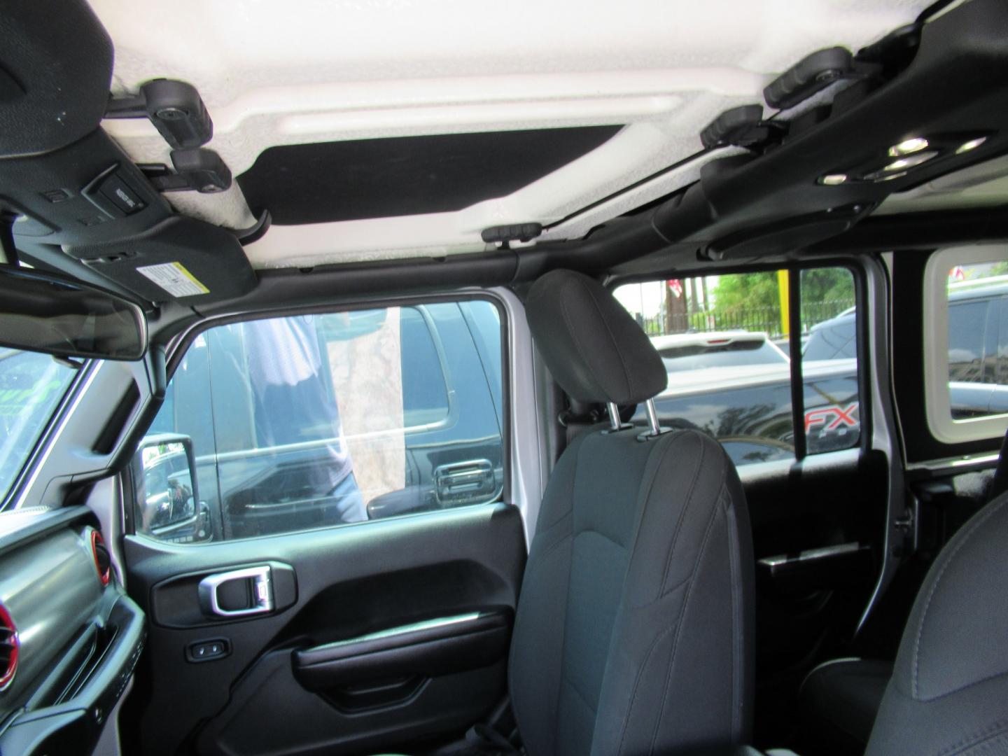 2020 Gray /Black Jeep Wrangler Unlimited Sport (1C4HJXDN7LW) with an 2.0L L4 DOHC 16V TURBO engine, 6A transmission, located at 1511 North Shepherd Dr., Houston, TX, 77008, (281) 657-1221, 29.798361, -95.412560 - 2020 Jeep Wrangler Unlimited Sport S 122,106 miles VIN: 1C4HJXDN7LW282475 Vehicle Details 4 Door Wagon/Sport Utility 2.0L I4 F DOHC 16V Gasoline Rear wheel drive w/ 4X4- Photo#7