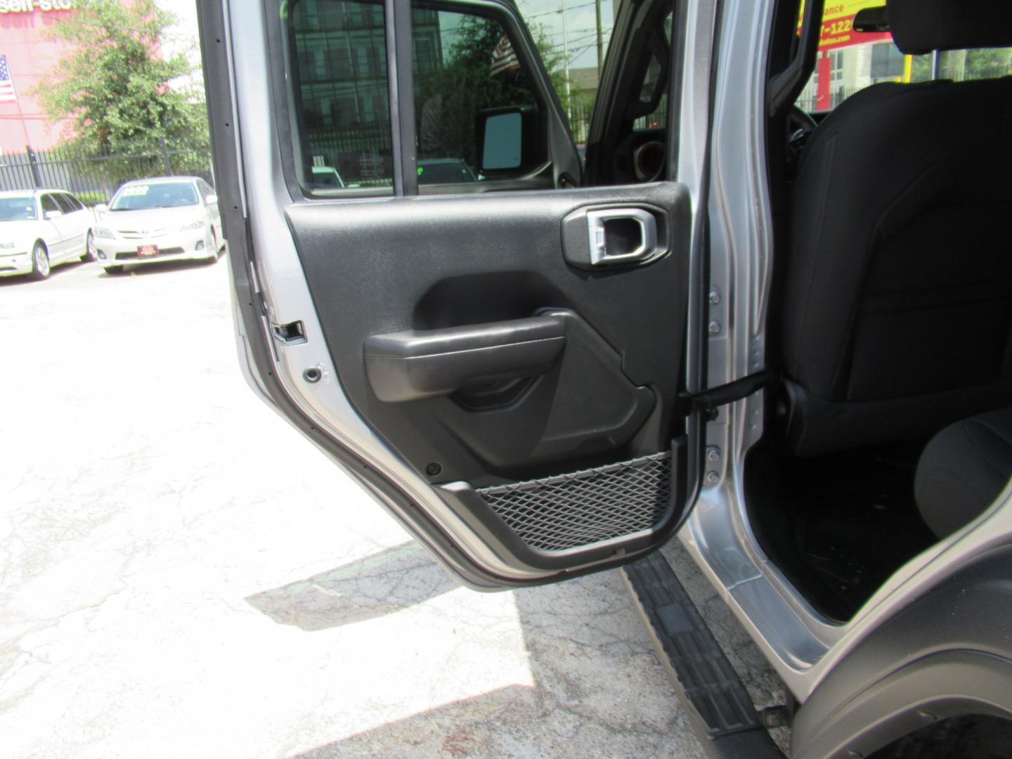 2020 Gray /Black Jeep Wrangler Unlimited Sport (1C4HJXDN7LW) with an 2.0L L4 DOHC 16V TURBO engine, 6A transmission, located at 1511 North Shepherd Dr., Houston, TX, 77008, (281) 657-1221, 29.798361, -95.412560 - 2020 Jeep Wrangler Unlimited Sport S 122,106 miles VIN: 1C4HJXDN7LW282475 Vehicle Details 4 Door Wagon/Sport Utility 2.0L I4 F DOHC 16V Gasoline Rear wheel drive w/ 4X4- Photo#12