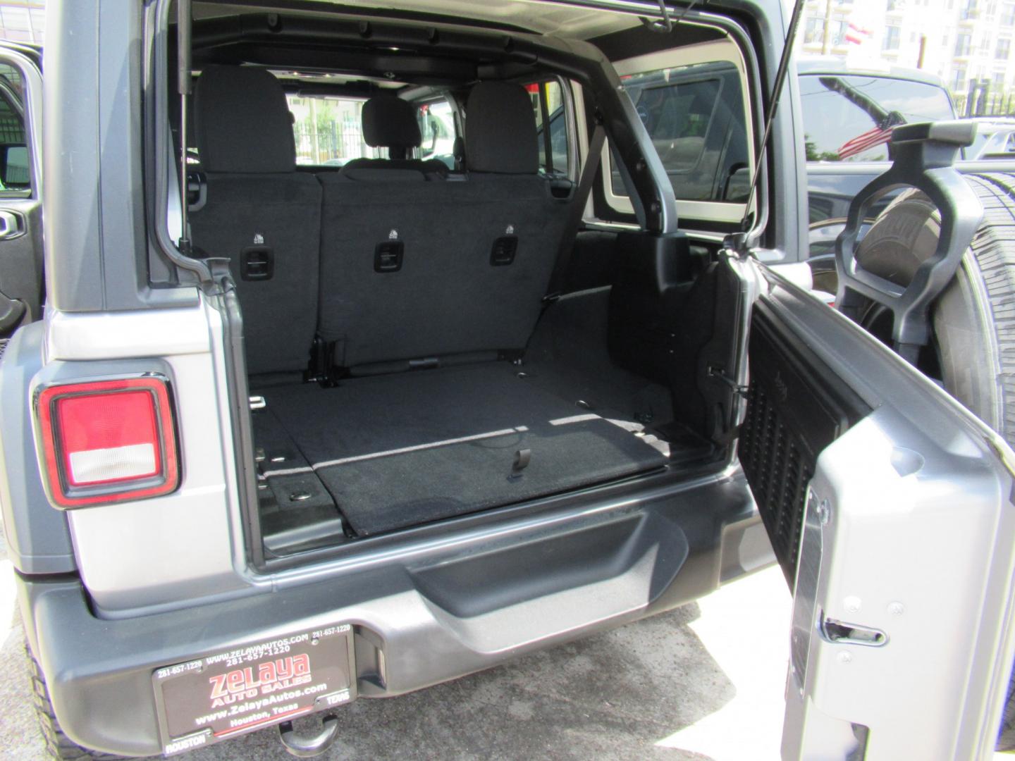 2020 Gray /Black Jeep Wrangler Unlimited Sport (1C4HJXDN7LW) with an 2.0L L4 DOHC 16V TURBO engine, 6A transmission, located at 1511 North Shepherd Dr., Houston, TX, 77008, (281) 657-1221, 29.798361, -95.412560 - 2020 Jeep Wrangler Unlimited Sport S 122,106 miles VIN: 1C4HJXDN7LW282475 Vehicle Details 4 Door Wagon/Sport Utility 2.0L I4 F DOHC 16V Gasoline Rear wheel drive w/ 4X4- Photo#13