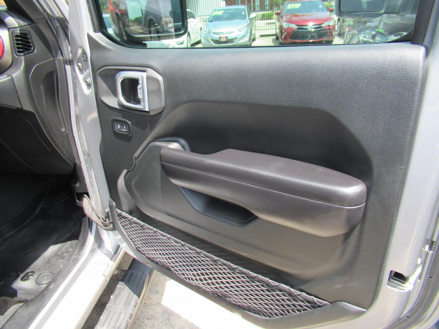 2020 Gray /Black Jeep Wrangler Unlimited Sport (1C4HJXDN7LW) with an 2.0L L4 DOHC 16V TURBO engine, 6A transmission, located at 1511 North Shepherd Dr., Houston, TX, 77008, (281) 657-1221, 29.798361, -95.412560 - 2020 Jeep Wrangler Unlimited Sport S 122,106 miles VIN: 1C4HJXDN7LW282475 Vehicle Details 4 Door Wagon/Sport Utility 2.0L I4 F DOHC 16V Gasoline Rear wheel drive w/ 4X4- Photo#17