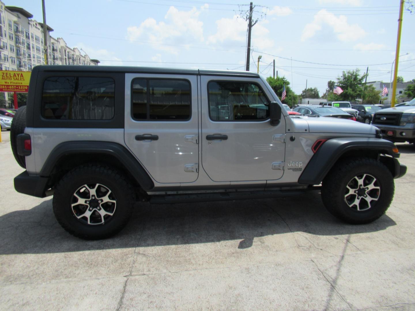 2020 Gray /Black Jeep Wrangler Unlimited Sport (1C4HJXDN7LW) with an 2.0L L4 DOHC 16V TURBO engine, 6A transmission, located at 1511 North Shepherd Dr., Houston, TX, 77008, (281) 657-1221, 29.798361, -95.412560 - 2020 Jeep Wrangler Unlimited Sport S 122,106 miles VIN: 1C4HJXDN7LW282475 Vehicle Details 4 Door Wagon/Sport Utility 2.0L I4 F DOHC 16V Gasoline Rear wheel drive w/ 4X4- Photo#23