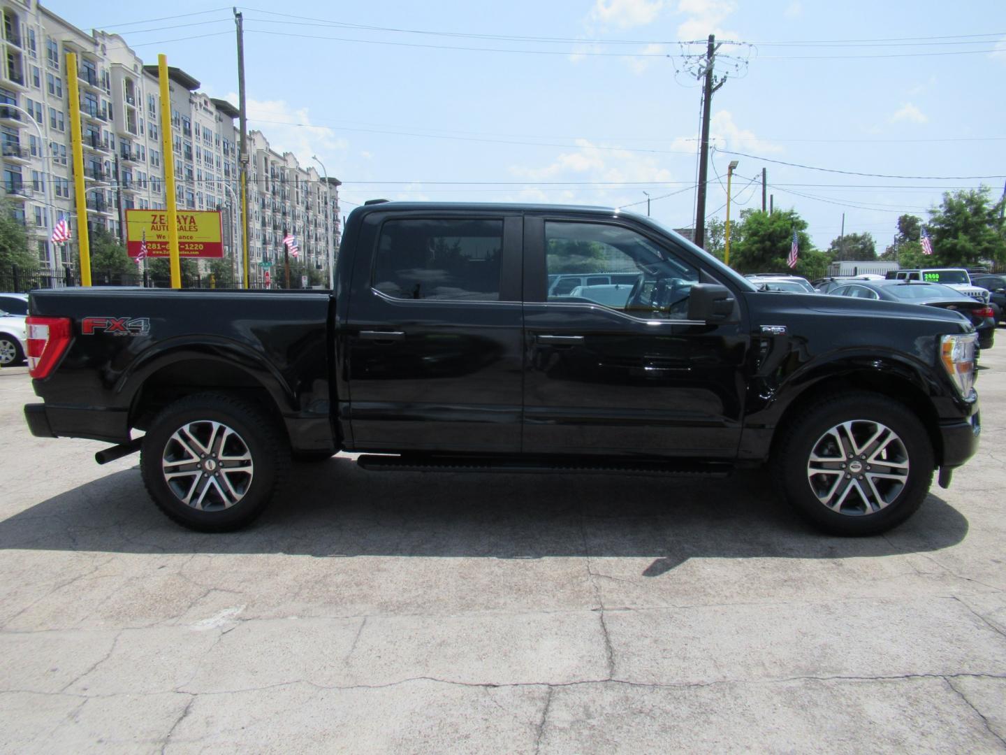 2022 Black /Black Ford F-150 XLT SuperCrew 6.5-ft. Bed 4WD (1FTEW1EP9NF) with an 2.7L V6 DOHC 24V engine, 6A transmission, located at 1511 North Shepherd Dr., Houston, TX, 77008, (281) 657-1221, 29.798361, -95.412560 - 2022 Ford F-150 XL 143,249 miles VIN: 1FTEW1EP9NFA10613 Vehicle Details Crew Pickup 2.7L V6 F DOHC 24V Gasoline Rear wheel drive w/ 4X4- Photo#21