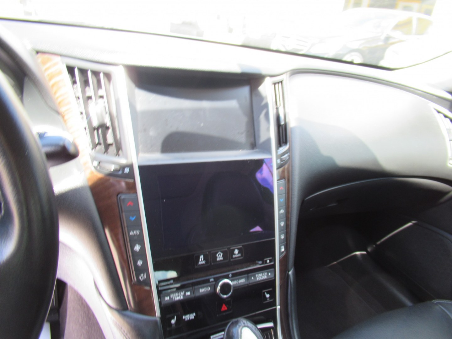 2015 Gray /Black Infiniti Q50 Premium (JN1BV7AP1FM) with an 3.7L V6 DOHC 24V HYBRID engine, 7A transmission, located at 1511 North Shepherd Dr., Houston, TX, 77008, (281) 657-1221, 29.798361, -95.412560 - 2015 Infiniti Q50 Premium 141,122 miles VIN: JN1BV7AP1FM346822 Vehicle Details Sedan 4 DR 3.7L V6 F DOHC 24V Gasoline Rear wheel drive- Photo#4