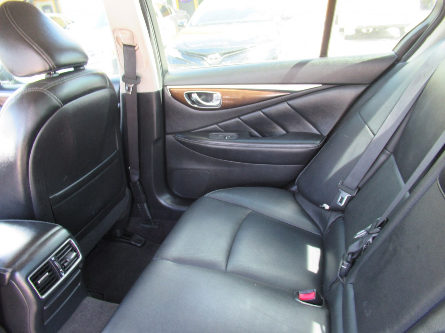 2015 Gray /Black Infiniti Q50 Premium (JN1BV7AP1FM) with an 3.7L V6 DOHC 24V HYBRID engine, 7A transmission, located at 1511 North Shepherd Dr., Houston, TX, 77008, (281) 657-1221, 29.798361, -95.412560 - 2015 Infiniti Q50 Premium 141,122 miles VIN: JN1BV7AP1FM346822 Vehicle Details Sedan 4 DR 3.7L V6 F DOHC 24V Gasoline Rear wheel drive- Photo#9