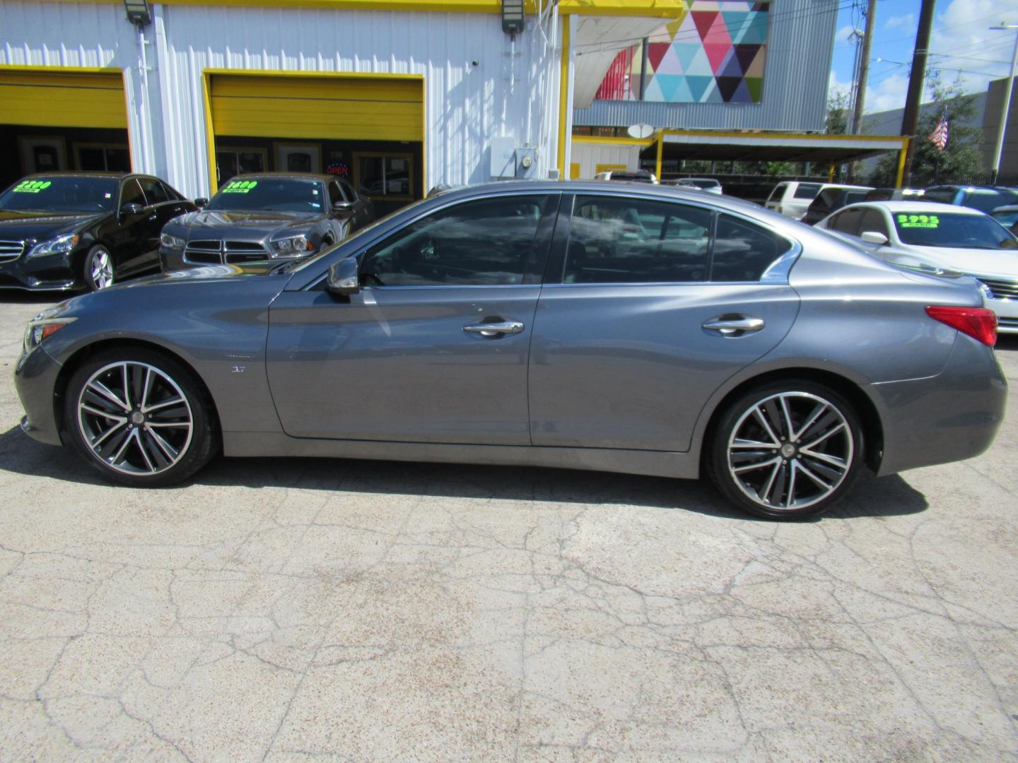 2015 Gray /Black Infiniti Q50 Premium (JN1BV7AP1FM) with an 3.7L V6 DOHC 24V HYBRID engine, 7A transmission, located at 1511 North Shepherd Dr., Houston, TX, 77008, (281) 657-1221, 29.798361, -95.412560 - 2015 Infiniti Q50 Premium 141,122 miles VIN: JN1BV7AP1FM346822 Vehicle Details Sedan 4 DR 3.7L V6 F DOHC 24V Gasoline Rear wheel drive- Photo#15