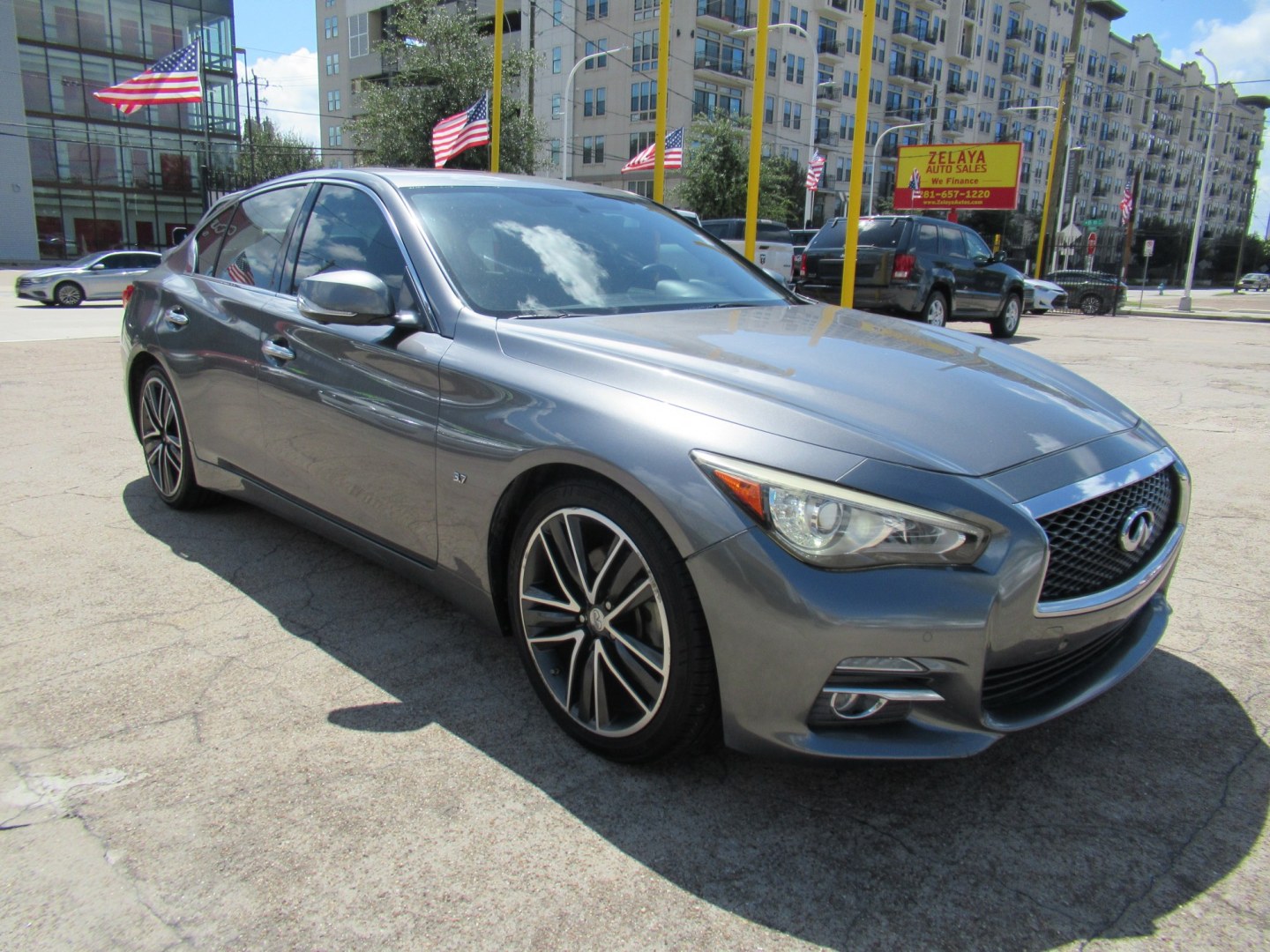 2015 Gray /Black Infiniti Q50 Premium (JN1BV7AP1FM) with an 3.7L V6 DOHC 24V HYBRID engine, 7A transmission, located at 1511 North Shepherd Dr., Houston, TX, 77008, (281) 657-1221, 29.798361, -95.412560 - 2015 Infiniti Q50 Premium 141,122 miles VIN: JN1BV7AP1FM346822 Vehicle Details Sedan 4 DR 3.7L V6 F DOHC 24V Gasoline Rear wheel drive- Photo#18