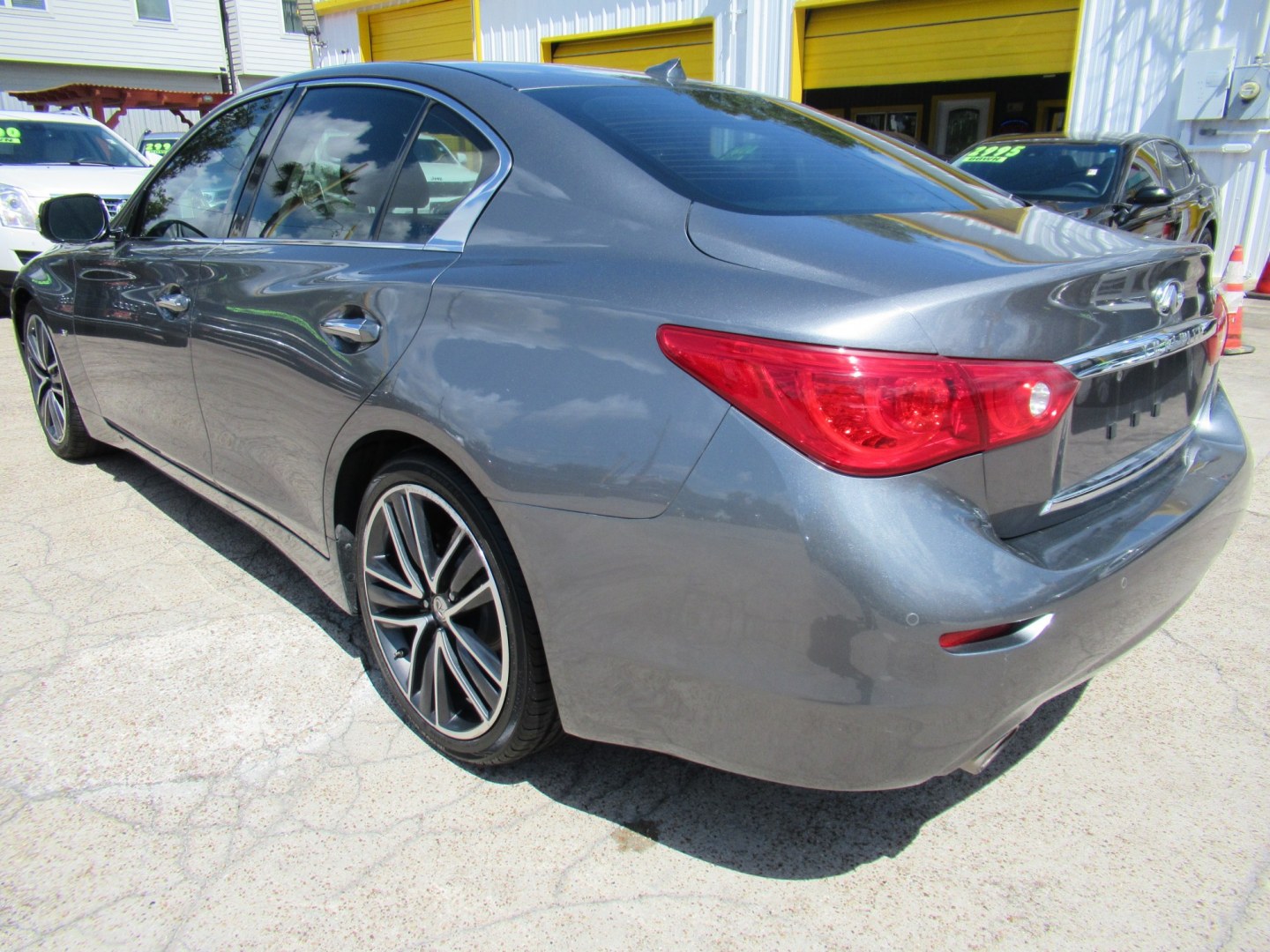2015 Gray /Black Infiniti Q50 Premium (JN1BV7AP1FM) with an 3.7L V6 DOHC 24V HYBRID engine, 7A transmission, located at 1511 North Shepherd Dr., Houston, TX, 77008, (281) 657-1221, 29.798361, -95.412560 - 2015 Infiniti Q50 Premium 141,122 miles VIN: JN1BV7AP1FM346822 Vehicle Details Sedan 4 DR 3.7L V6 F DOHC 24V Gasoline Rear wheel drive- Photo#22