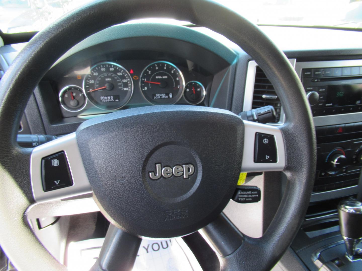 2008 BLUE /Gray Jeep Grand Cherokee Laredo 4WD (1J8GR48K38C) with an 3.7L V6 SOHC 12V engine, 5A OD transmission, located at 1511 North Shepherd Dr., Houston, TX, 77008, (281) 657-1221, 29.798361, -95.412560 - 2008 Jeep Grand Cherokee Laredo 156,835 miles VIN: 1J8GR48K38C184001 Vehicle Details 4 Door Wagon/Sport Utility 3.7L V6 F Gasoline Rear wheel drive w/ 4X4- Photo#4