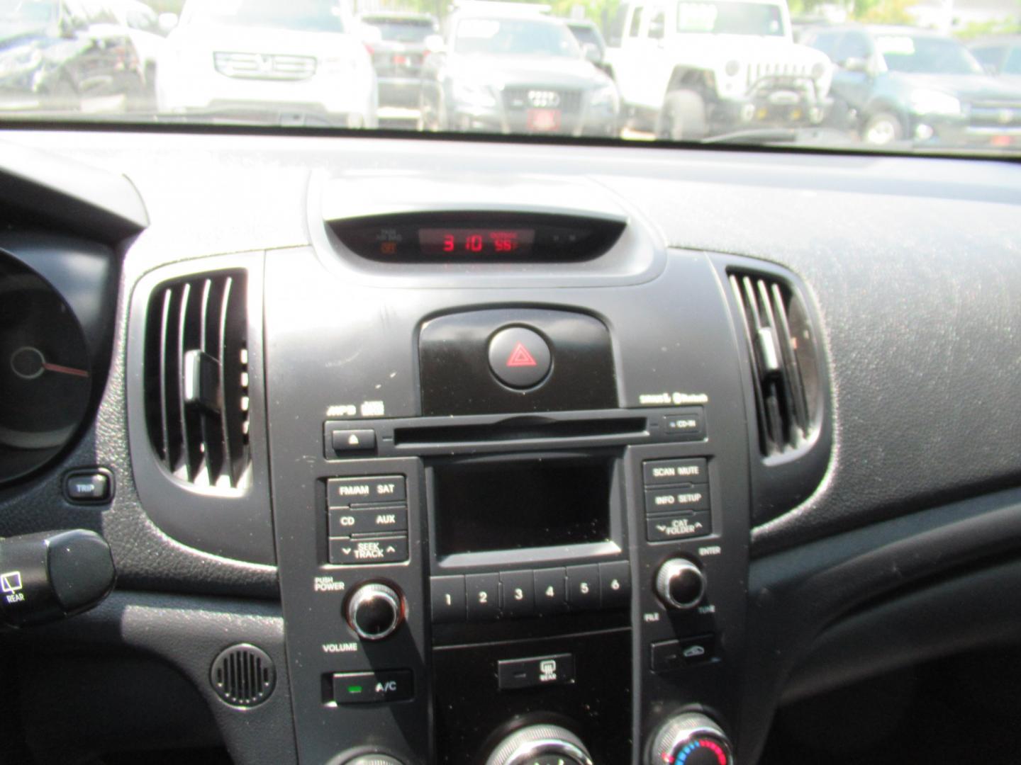 2011 Red /Black Kia Forte 5-Door EX (KNAFU5A24B5) with an 2.0L L4 DOHC 16V engine, Automatic transmission, located at 1511 North Shepherd Dr., Houston, TX, 77008, (281) 657-1221, 29.798361, -95.412560 - 2011 Kia Forte5 EX 135,659 miles VIN: KNAFU5A24B5320128 Vehicle Details Hatchback 4 DR 2.0L I4 F DOHC 16V Gasoline Front wheel drive- Photo#2
