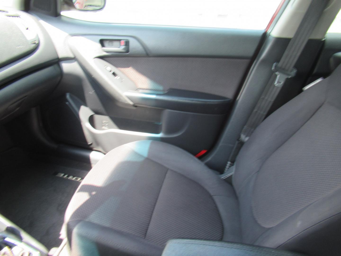 2011 Red /Black Kia Forte 5-Door EX (KNAFU5A24B5) with an 2.0L L4 DOHC 16V engine, Automatic transmission, located at 1511 North Shepherd Dr., Houston, TX, 77008, (281) 657-1221, 29.798361, -95.412560 - 2011 Kia Forte5 EX 135,659 miles VIN: KNAFU5A24B5320128 Vehicle Details Hatchback 4 DR 2.0L I4 F DOHC 16V Gasoline Front wheel drive- Photo#5