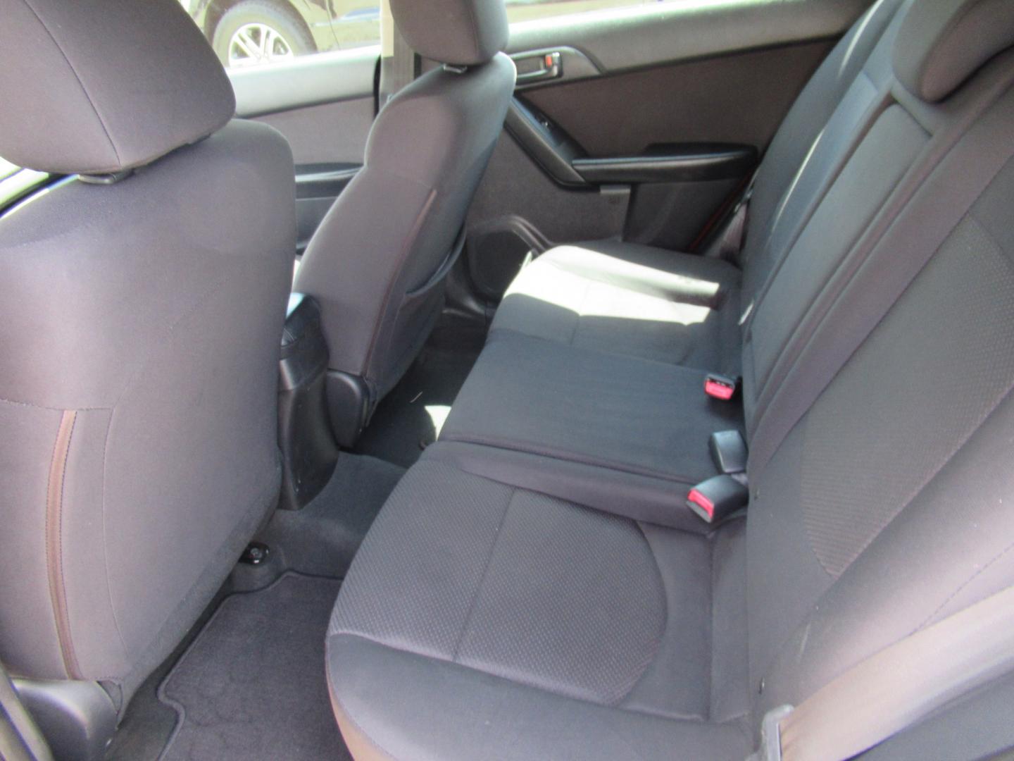 2011 Red /Black Kia Forte 5-Door EX (KNAFU5A24B5) with an 2.0L L4 DOHC 16V engine, Automatic transmission, located at 1511 North Shepherd Dr., Houston, TX, 77008, (281) 657-1221, 29.798361, -95.412560 - 2011 Kia Forte5 EX 135,659 miles VIN: KNAFU5A24B5320128 Vehicle Details Hatchback 4 DR 2.0L I4 F DOHC 16V Gasoline Front wheel drive- Photo#10