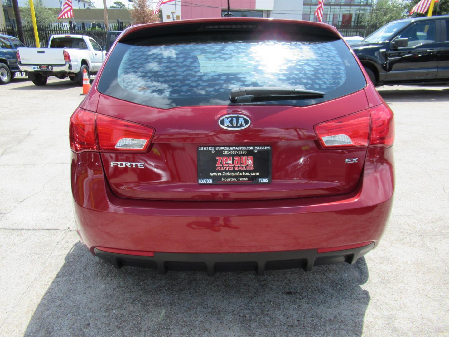 2011 Red /Black Kia Forte 5-Door EX (KNAFU5A24B5) with an 2.0L L4 DOHC 16V engine, Automatic transmission, located at 1511 North Shepherd Dr., Houston, TX, 77008, (281) 657-1221, 29.798361, -95.412560 - 2011 Kia Forte5 EX 135,659 miles VIN: KNAFU5A24B5320128 Vehicle Details Hatchback 4 DR 2.0L I4 F DOHC 16V Gasoline Front wheel drive- Photo#19