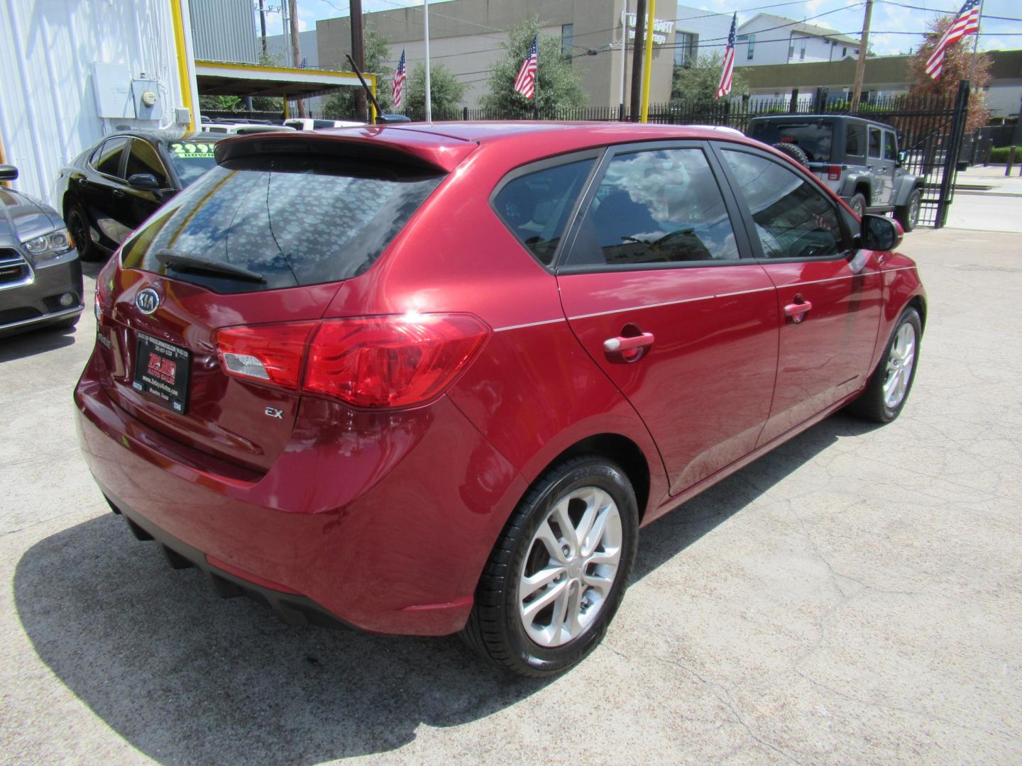 2011 Red /Black Kia Forte 5-Door EX (KNAFU5A24B5) with an 2.0L L4 DOHC 16V engine, Automatic transmission, located at 1511 North Shepherd Dr., Houston, TX, 77008, (281) 657-1221, 29.798361, -95.412560 - 2011 Kia Forte5 EX 135,659 miles VIN: KNAFU5A24B5320128 Vehicle Details Hatchback 4 DR 2.0L I4 F DOHC 16V Gasoline Front wheel drive- Photo#20